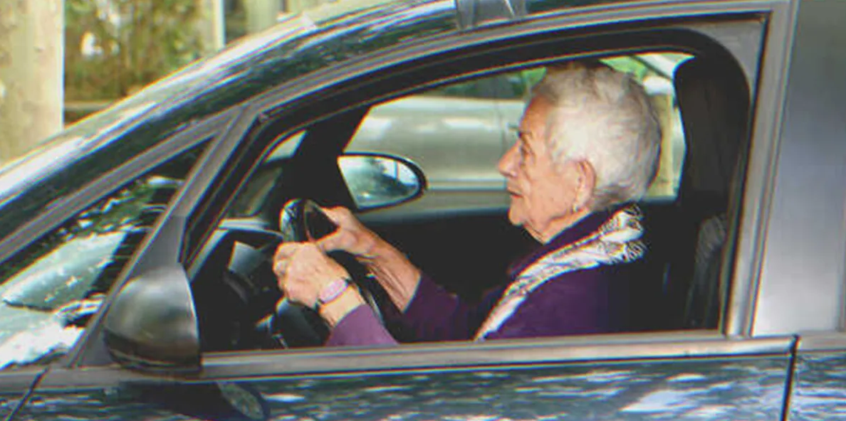 An old lady driving | Source: Shutterstock