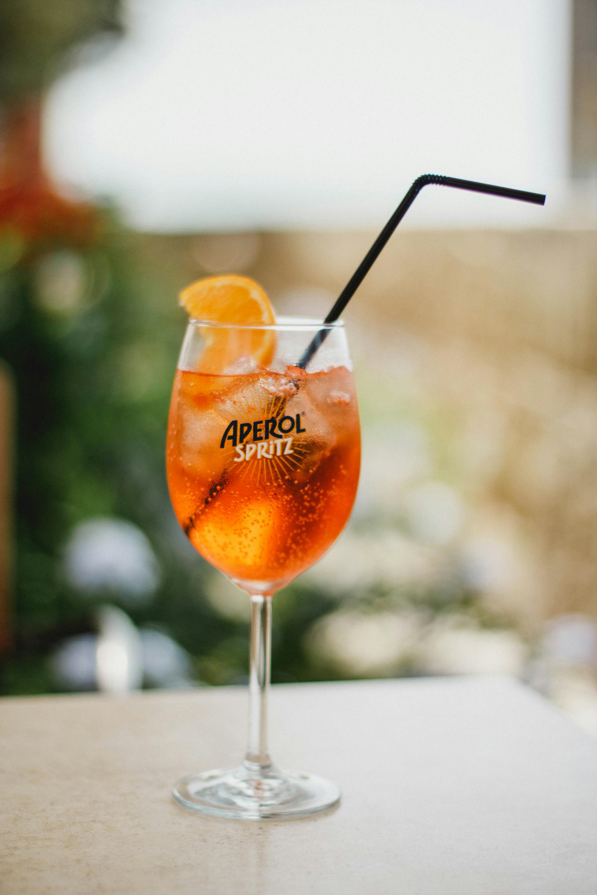 A cocktail with a black straw | Source: Pexels