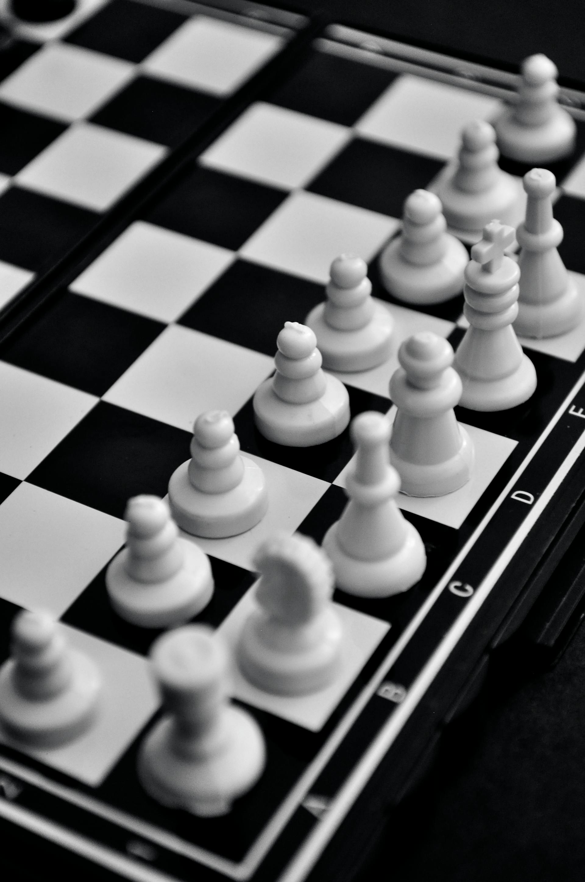 A closeup shot of chess pieces on a chess board | Source: Pexels