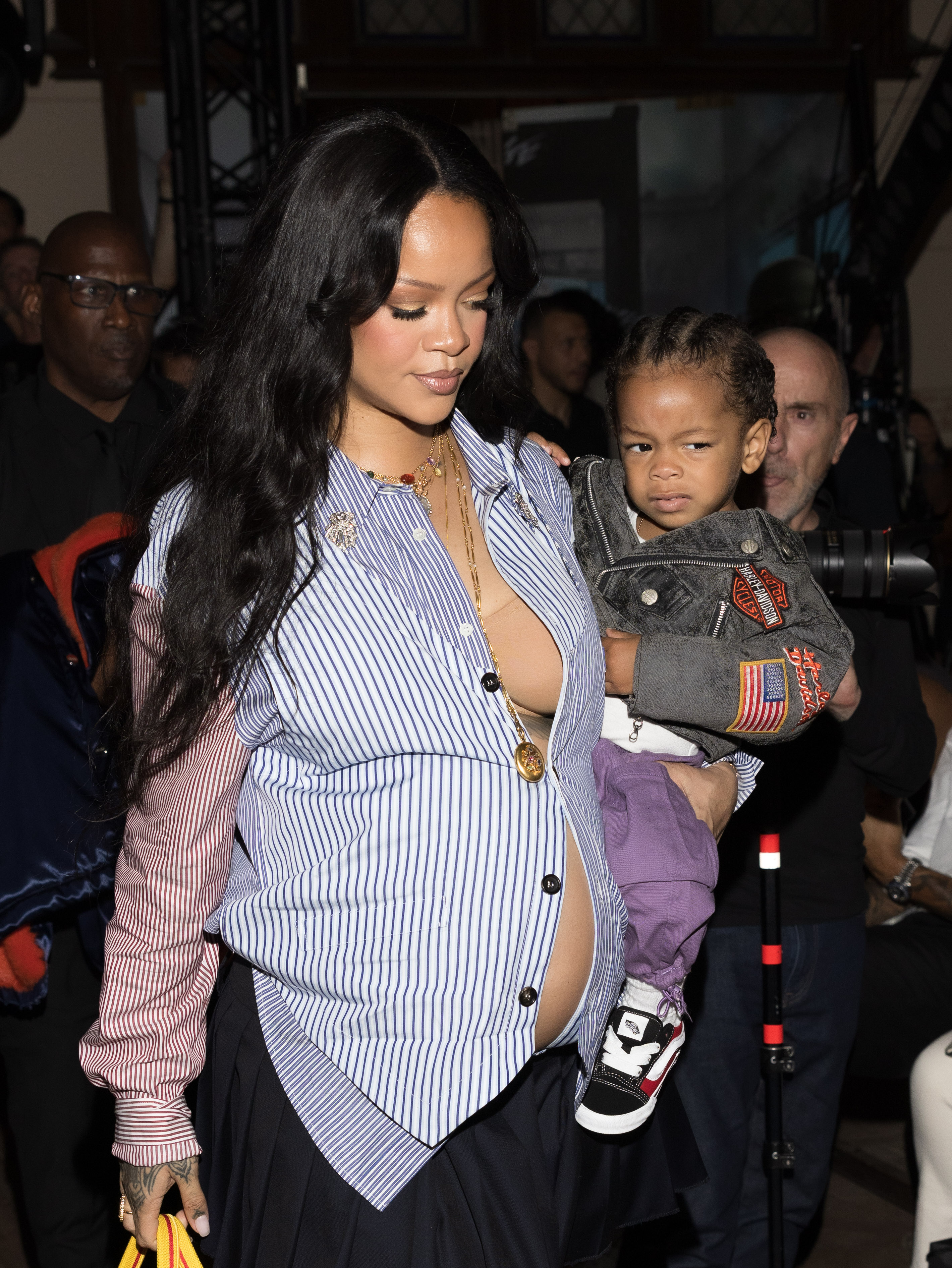 Rihanna carrying her son Riot at the AWGE Menswear Spring/Summer 2026 show during Paris Fashion Week, June 27, 2025 | Source: Getty Images