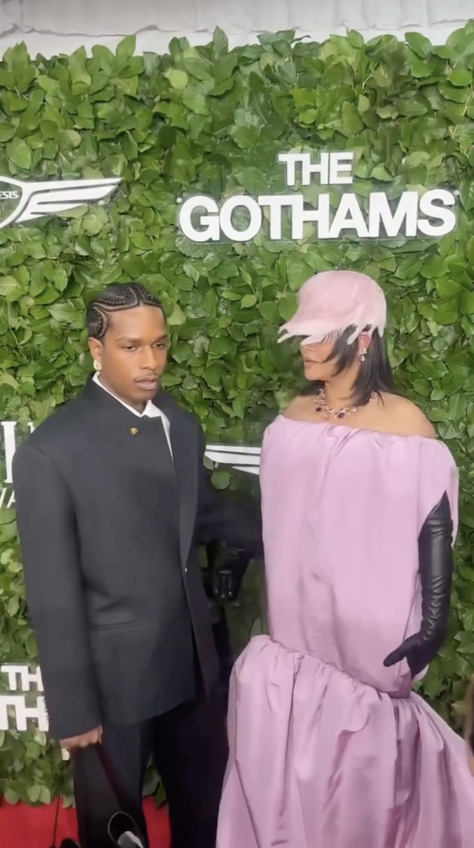 Rihanna looks directly at Rocky while he gazes ahead, the pair standing close in contrasting energy. Her gloved hand rests on her hip, capturing a moment of subtle tension and elegance. | Source: Instagram/people