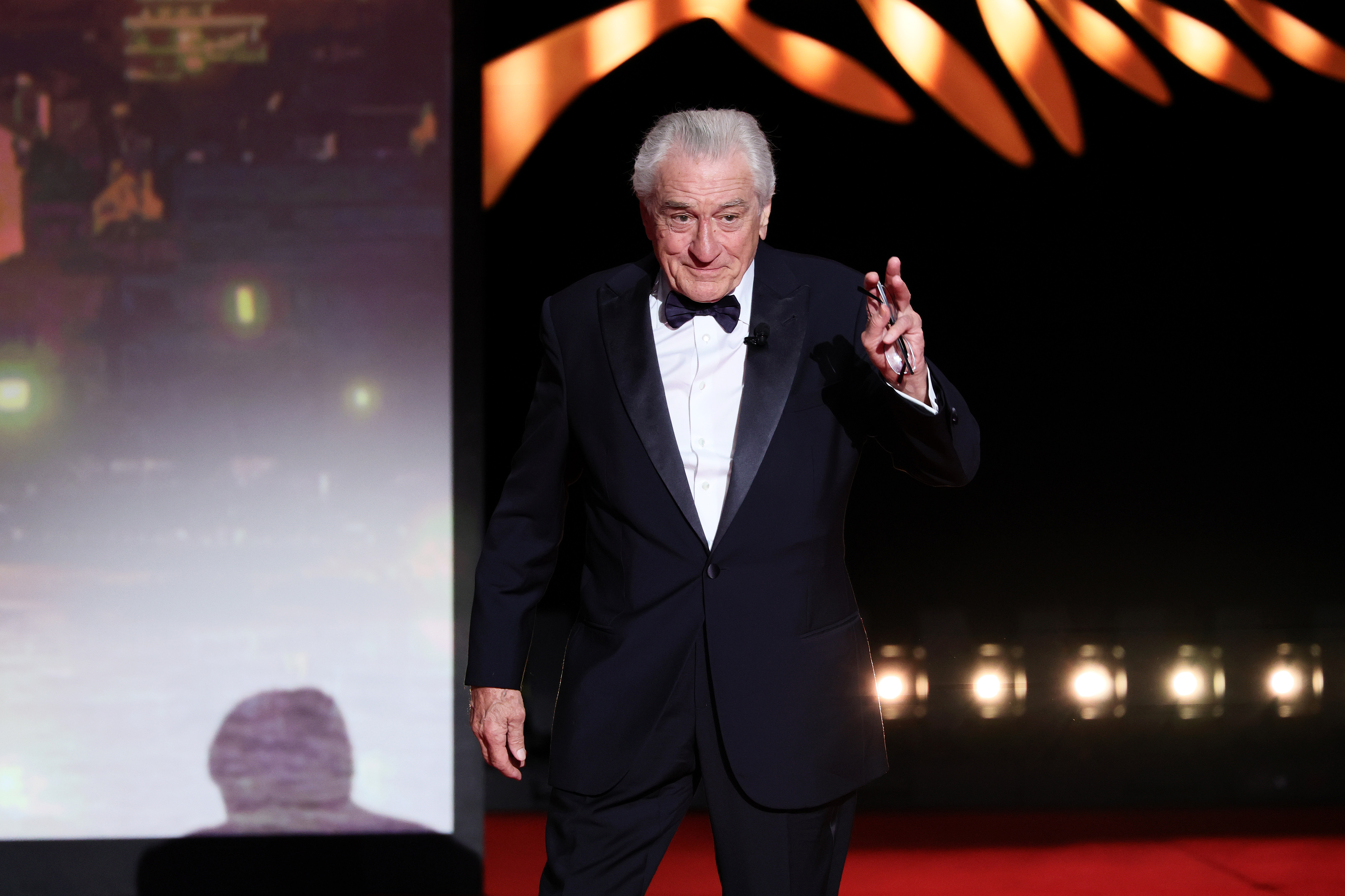 Honoree Robert De Niro walks onstage during the opening ceremony at the 78th annual Cannes Film Festival at the Palais de Festival on May 13, 2025, in France | Source: Getty Images