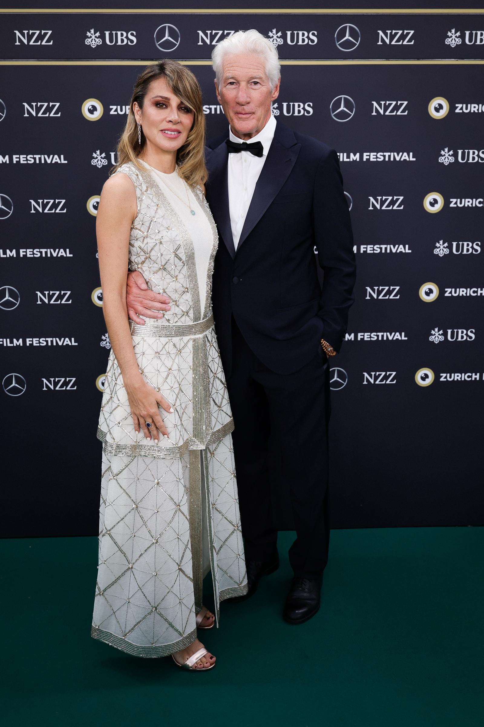 Alejandra Silva and Richard Gere at the "Wisdom of Happiness" premiere during the 20th Zurich Film Festival at Corso in Zurich, Switzerland, on October 8, 2024 | Source: Getty Images