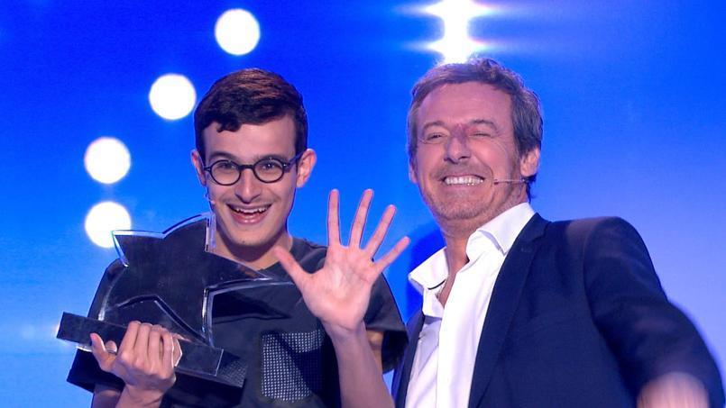 La photo de Paul avec Jean-Luc Reichmann | Source: Twitter TV magazine