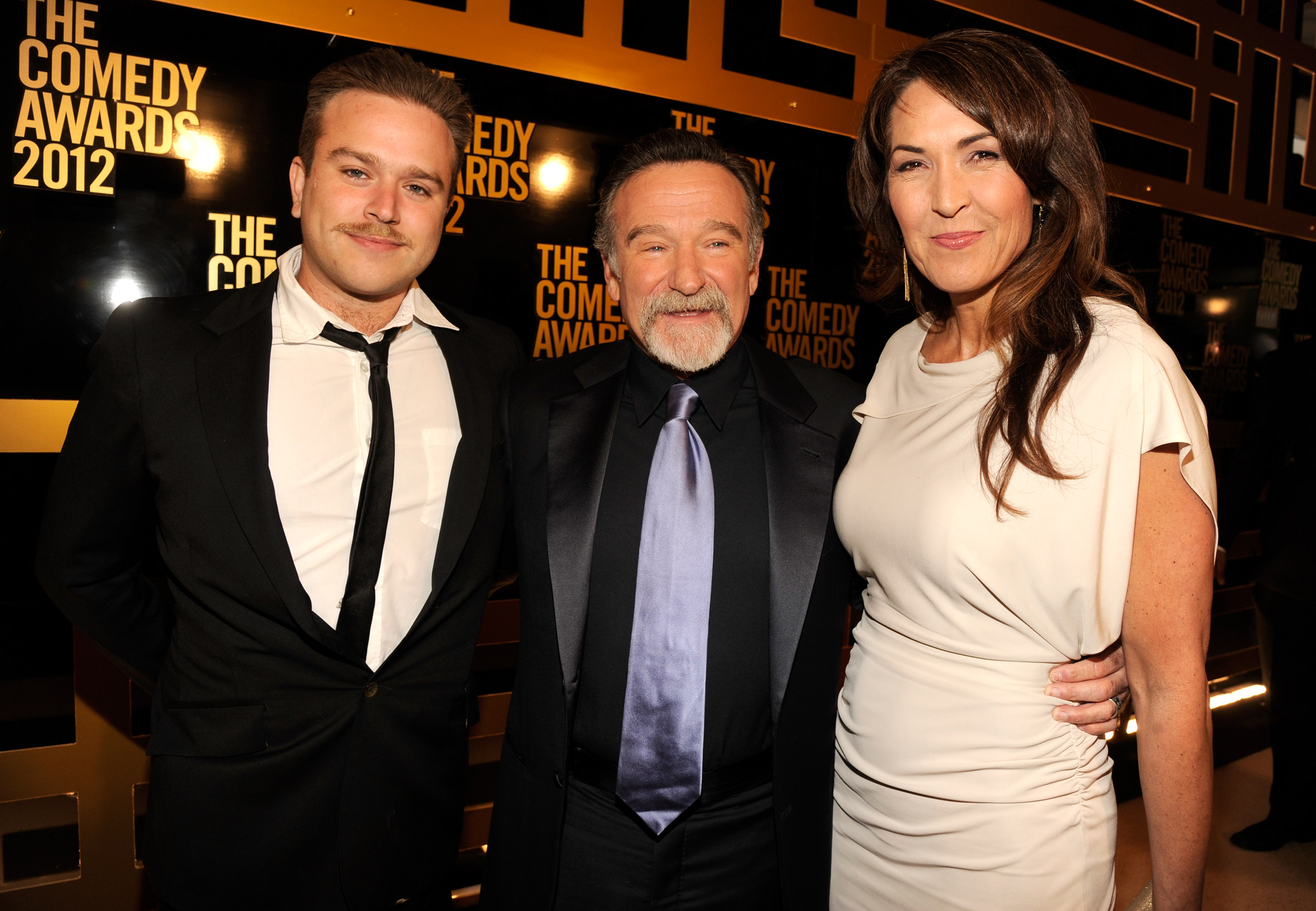 Zachary and Robin Williams and Susan Schneider at The Comedy Awards on April 28, 2012, in New York City | Source: Getty Images