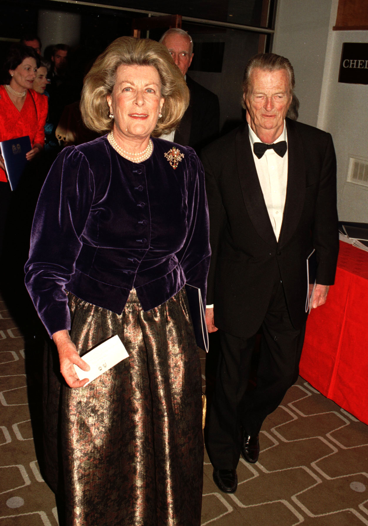 Taken on 19 November 1997 at the Royal Festival Hall, Lady Pamela Hicks arrives with her husband for the Royal Gala Concert celebrating the 50th wedding anniversary of Queen Elizabeth II and Prince Philip, Duke of Edinburgh, appearing elegant as they join guests for the occasion.