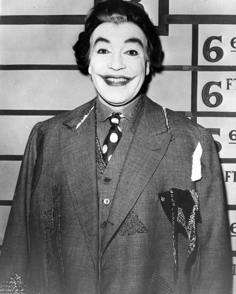 Cesar Romero as The Joker, a devious villain in the 'Batman' television series. | Getty Images