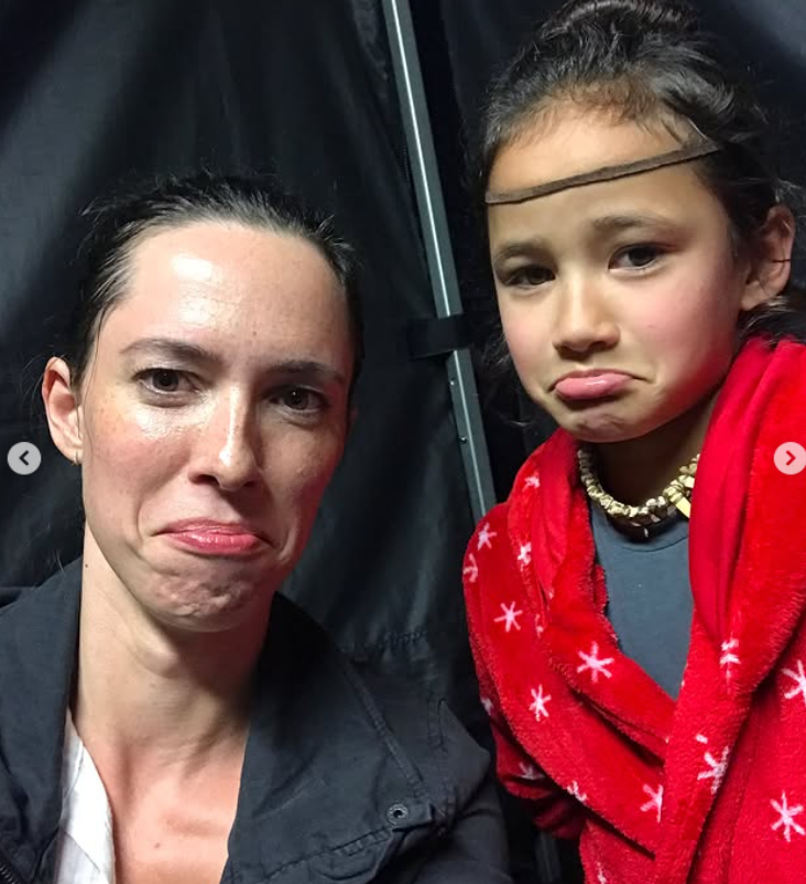 Rebecca Hall and Kaylee Hottle make matching playful expressions in a behind-the-scenes selfie taken during production of one of the "Godzilla" films. Rebecca included the image in a series of photos honoring her co-star's memory. | Source: Instagram/rebeccahall