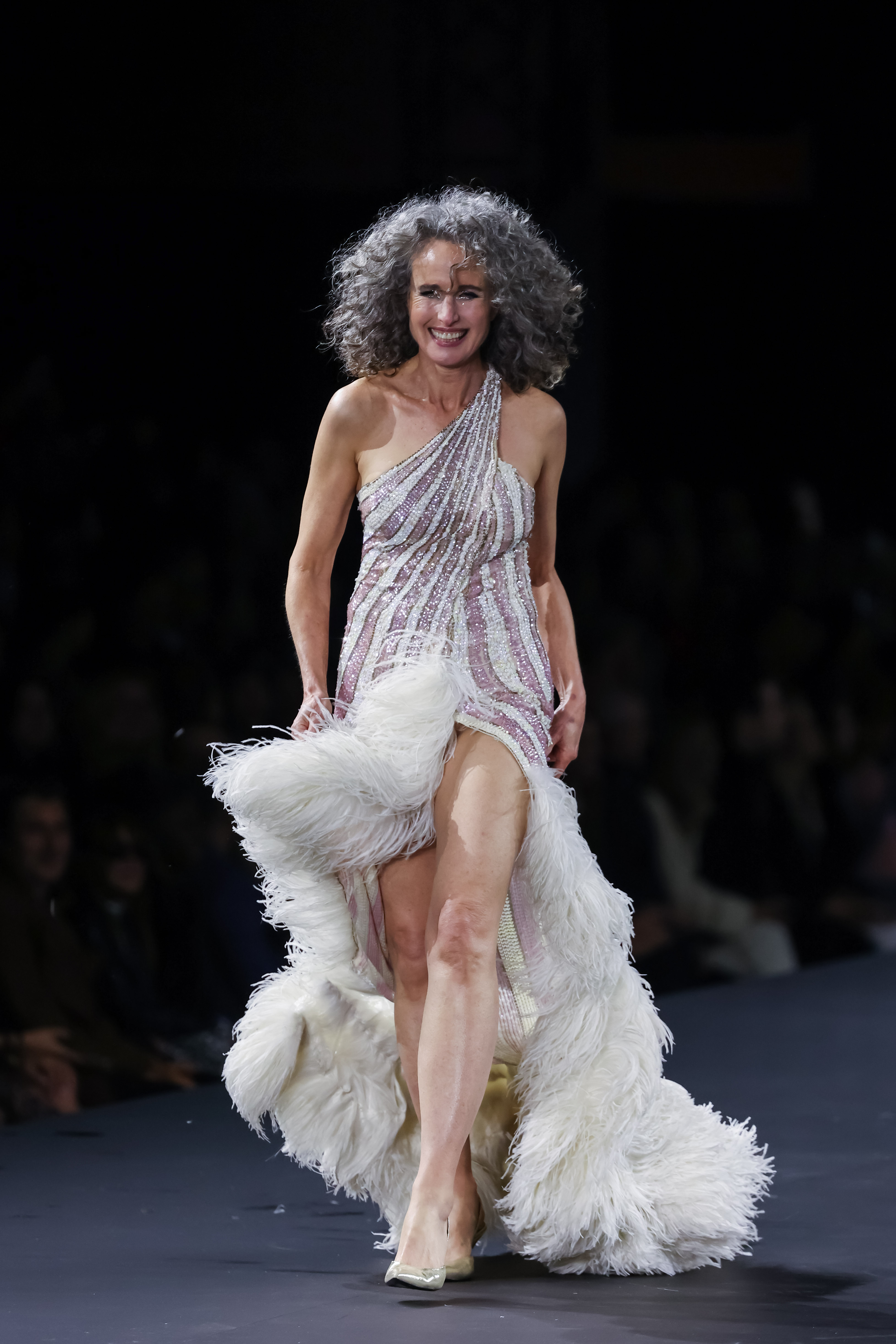 Andie MacDowell graces the runway during the "Le Défilé Walk Your Worth" by L'Oreal Womenswear Spring/Summer 2023 show as part of Paris Fashion Week on October 2, 2022, in Paris, France | Source: Getty Images