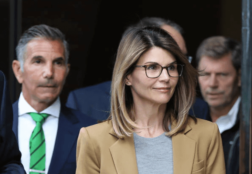 For their role in the national college admission scandal, Lori Loughlin and her husband, Mossimo Giannulli leave the John Joseph Moakley United States Courthouse, on April 3, 2019, Boston | Source: Pat Greenhouse/The Boston Globe via Getty Images
