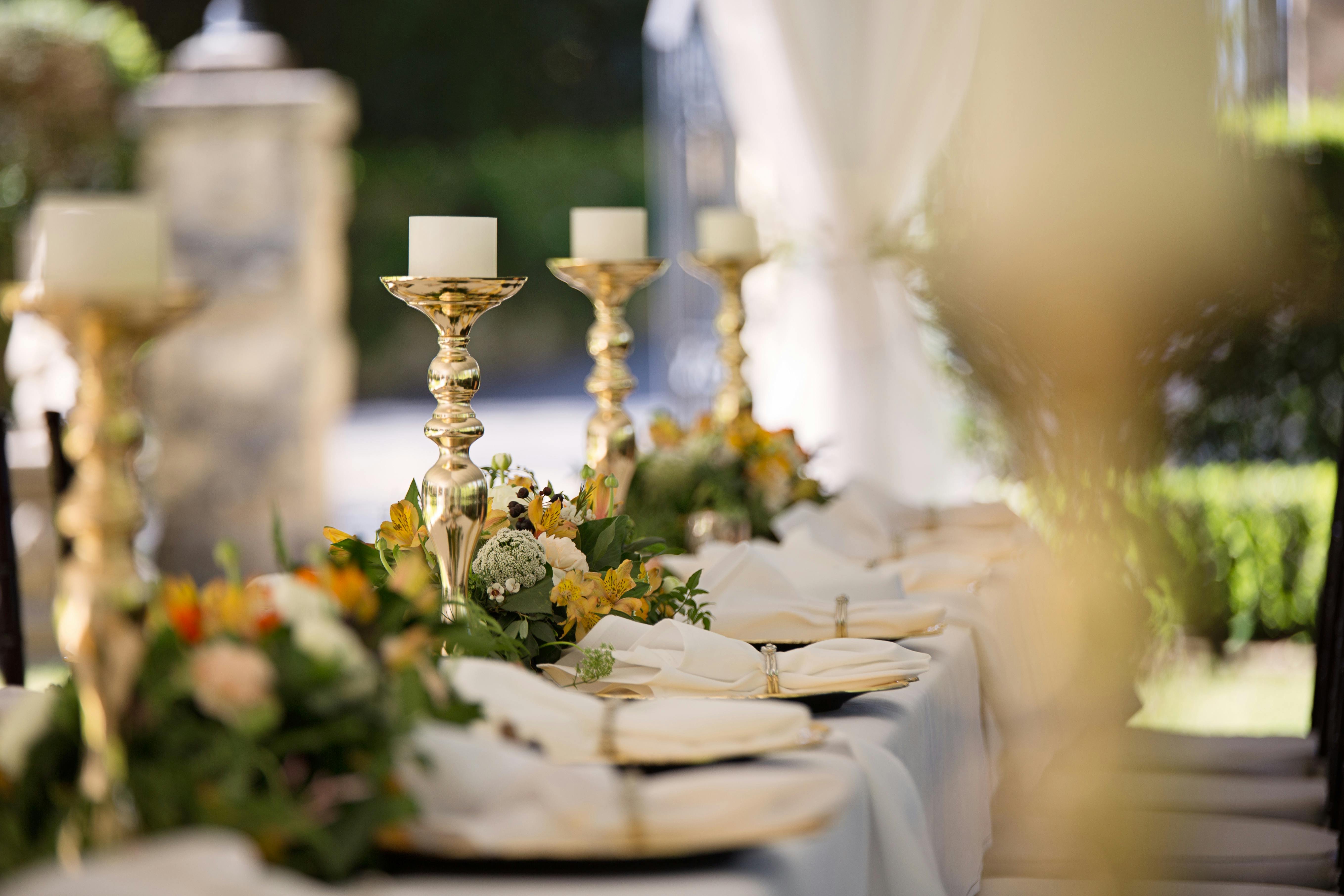 For illustration purposes only. Wedding tables set for the reception | Source: Pexels