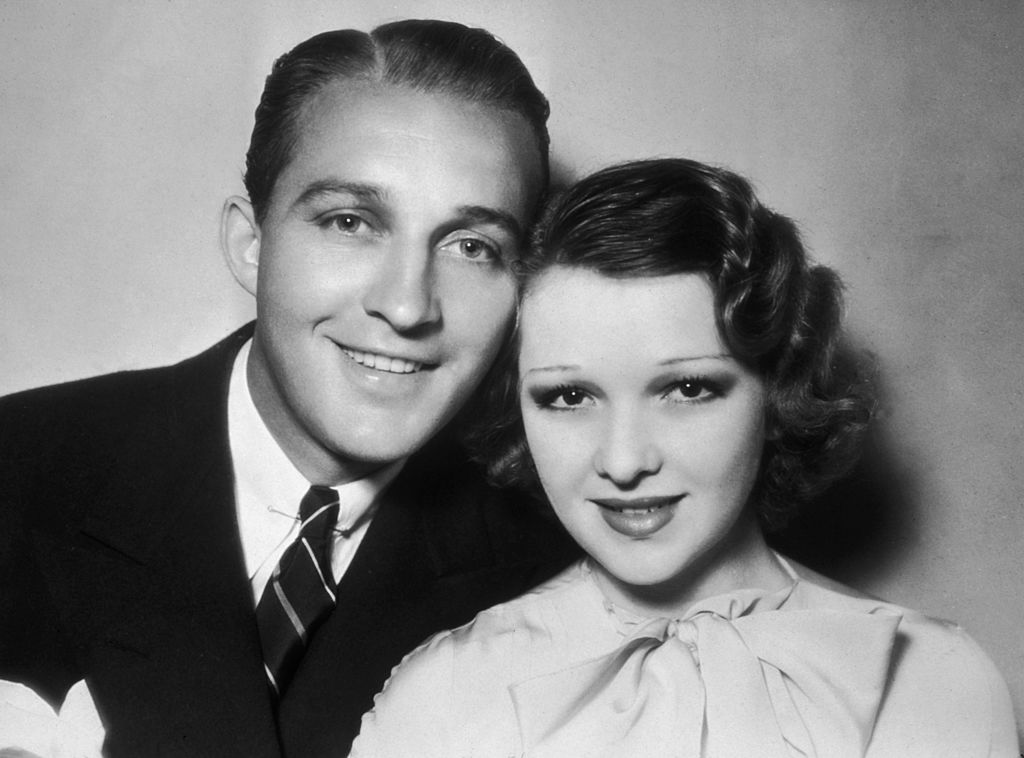 Dixie Lee and Bing Crosby smiling while posing for the camera in January 1935. | Photo: Getty Images