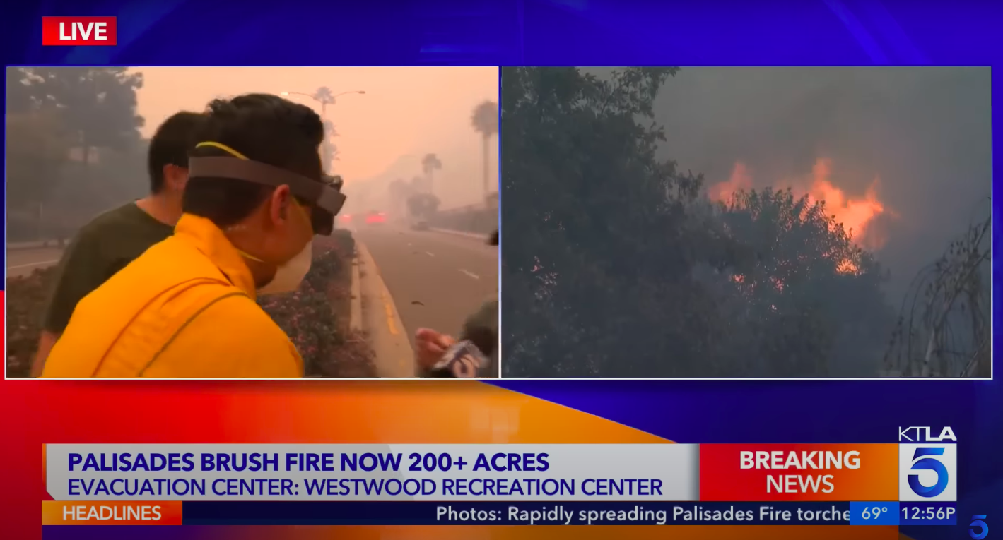 A KTLA 5 news reporter speaking to civilians. | Source: YouTube/KTLA 5