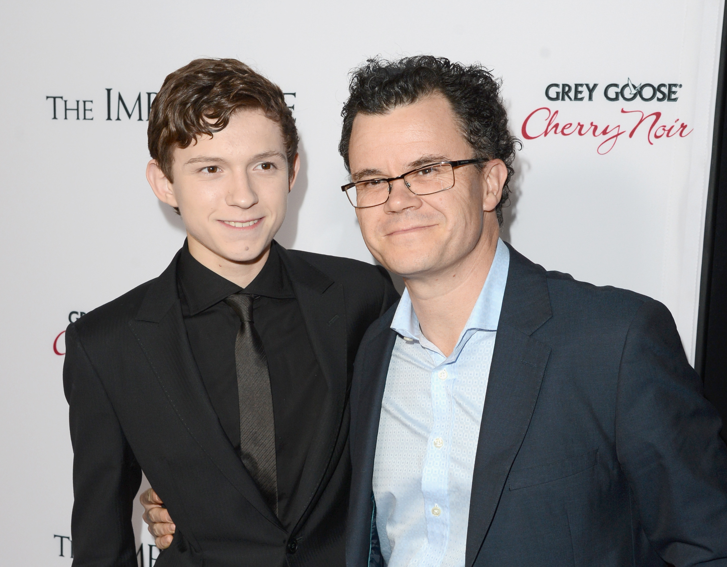 Actor Tom Holland and his father Dominic attend the Los Angeles premiere of Summit Entertainment's "The Impossible" at ArcLight Cinemas Cinerama Dome in Hollywood, California on December 10, 2012 | Source: Getty Images