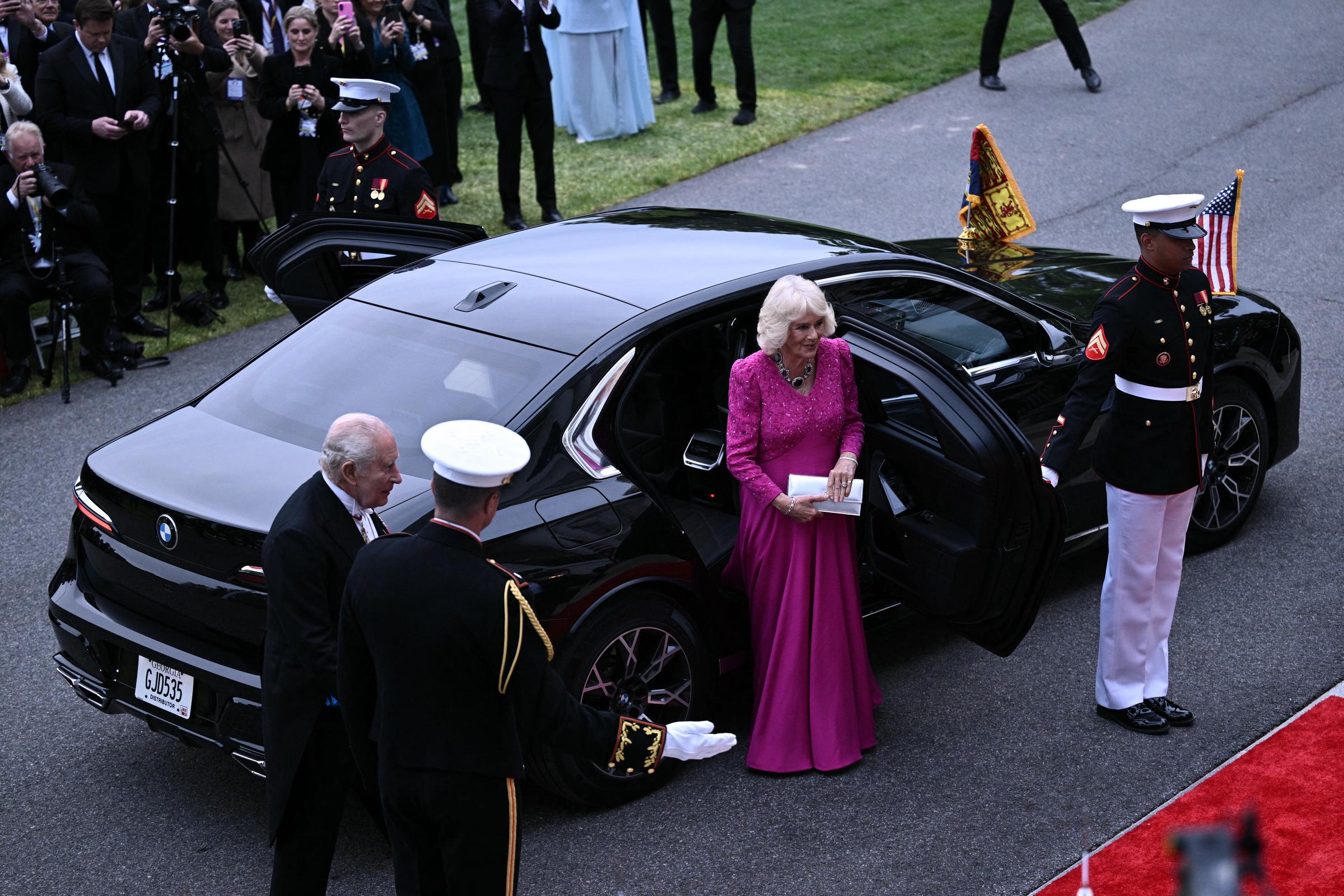 King Charles III and Queen Camilla step out of the vehicle as they attend a State Dinner hosted by Donald and Melania Trump in the White House East Room, April 28, 2026. | Source: Getty Images