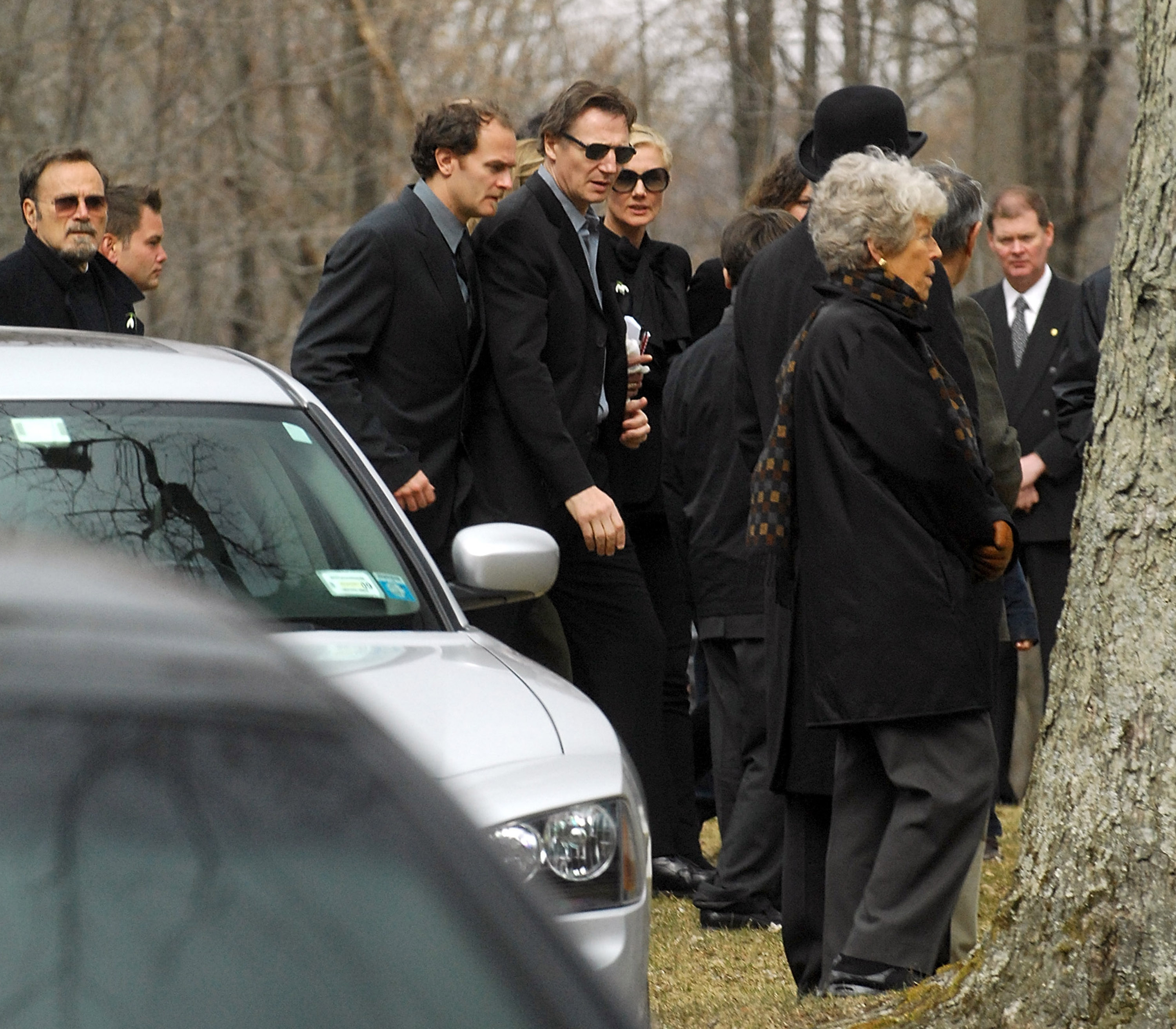 Liam Neeson (3rd-L), his sister-in-law Joely Richardson (5th-L) and screenwriter Carlo Gabriel Nero (4th-L) arrive for the funeral of actress Natasha Richardson at St. Peter's Lithgow Episcopal Church on 22 March 2009 in Lithgow, New York. | Source: Getty Images