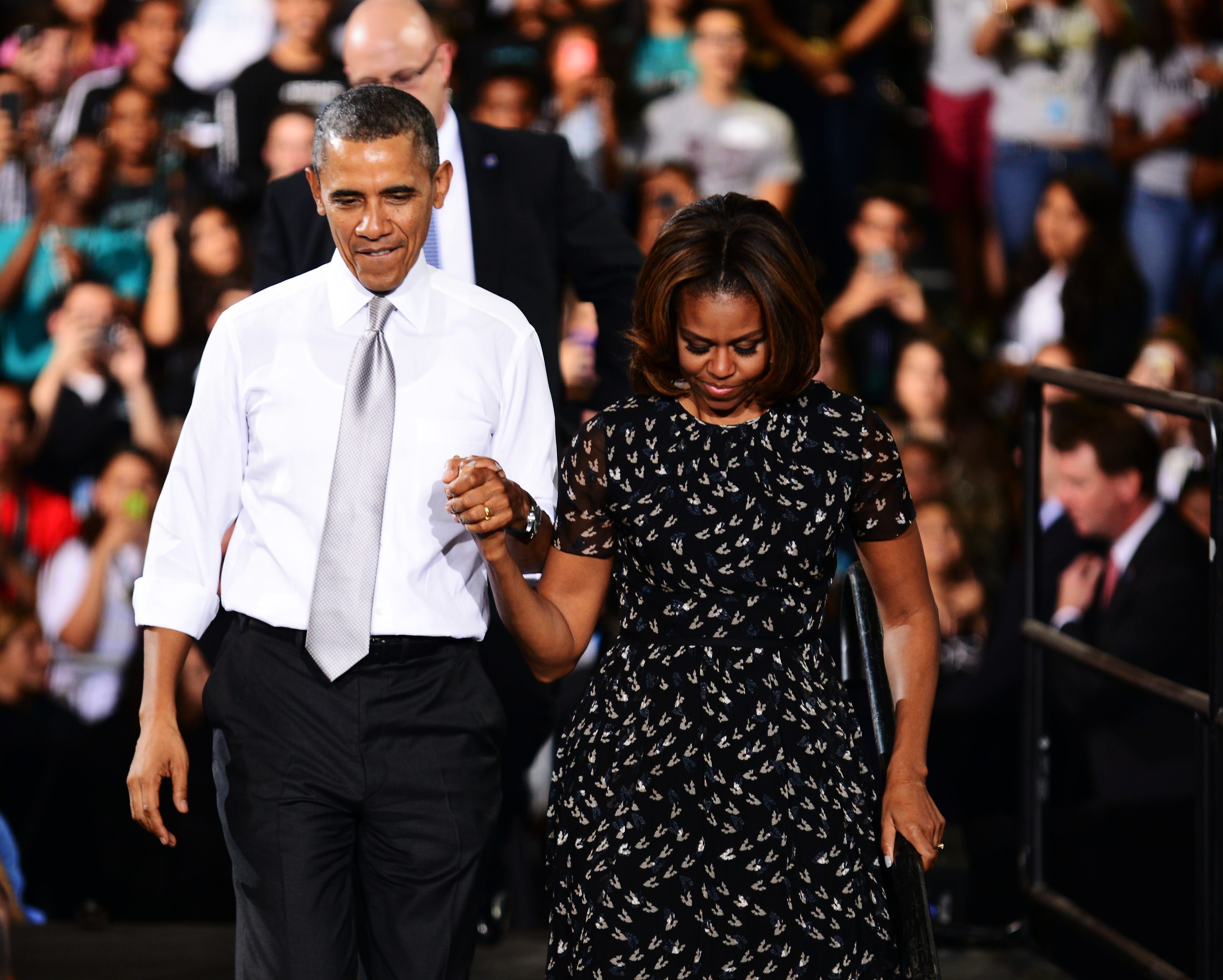 Barack and Michelle Obama greeting students at the Coral Reef High School in Miami on March 7, 2014, in Florida. | Source: Getty Images