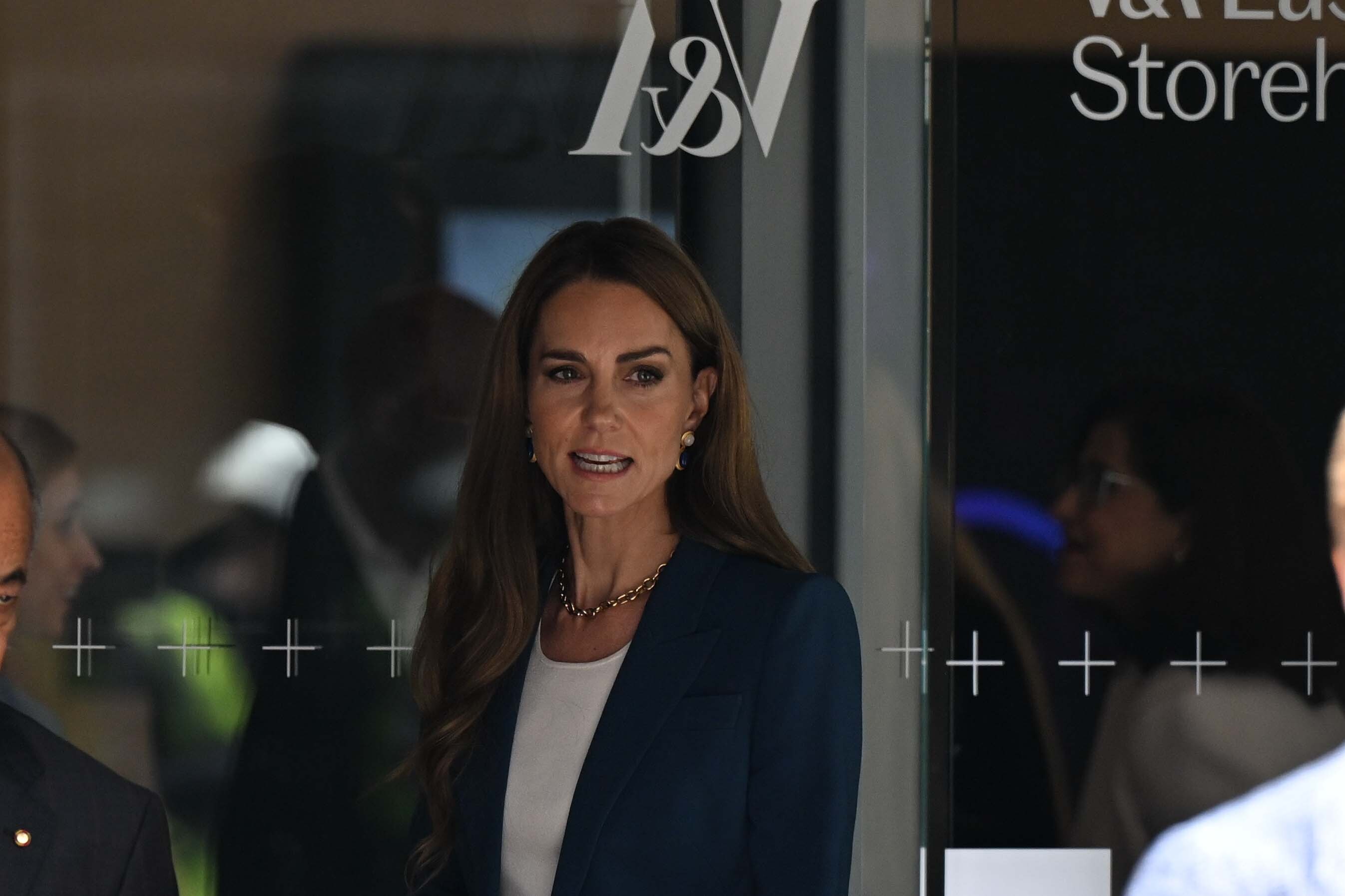 Princess Catherine is seen arriving at the V&A East Storehouse in East London on June 10, 2025, wearing a tailored royal blue suit and statement necklace as she prepares to tour the museum's innovative new public collections facility.