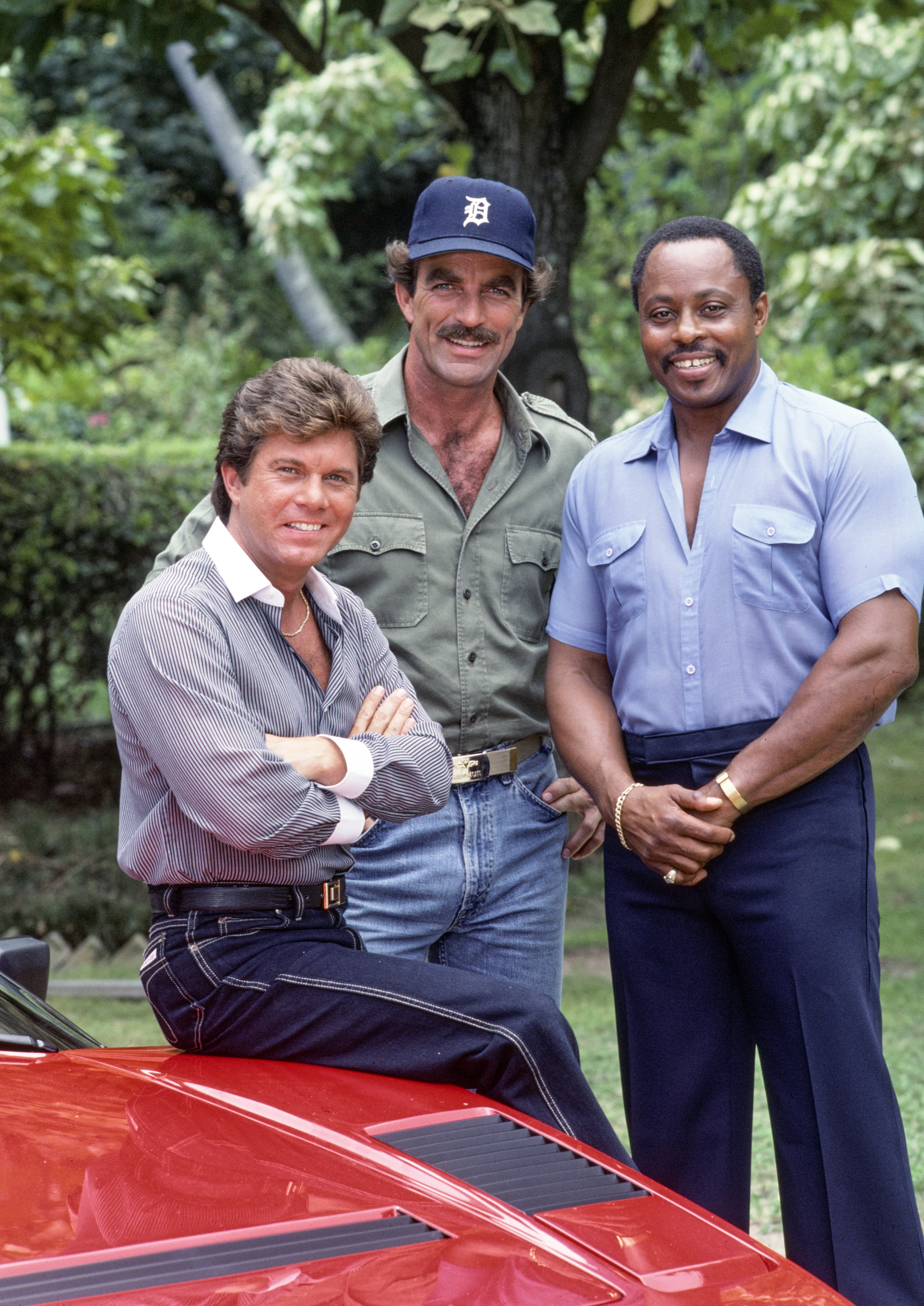 Pictured from left is Larry Manetti (as Orville 'Rick' Wright), Tom Selleck (as Magnum), Roger E. Mosley (as Theodore 'TC' Calvin) in the CBS television series | Source: Getty Images
