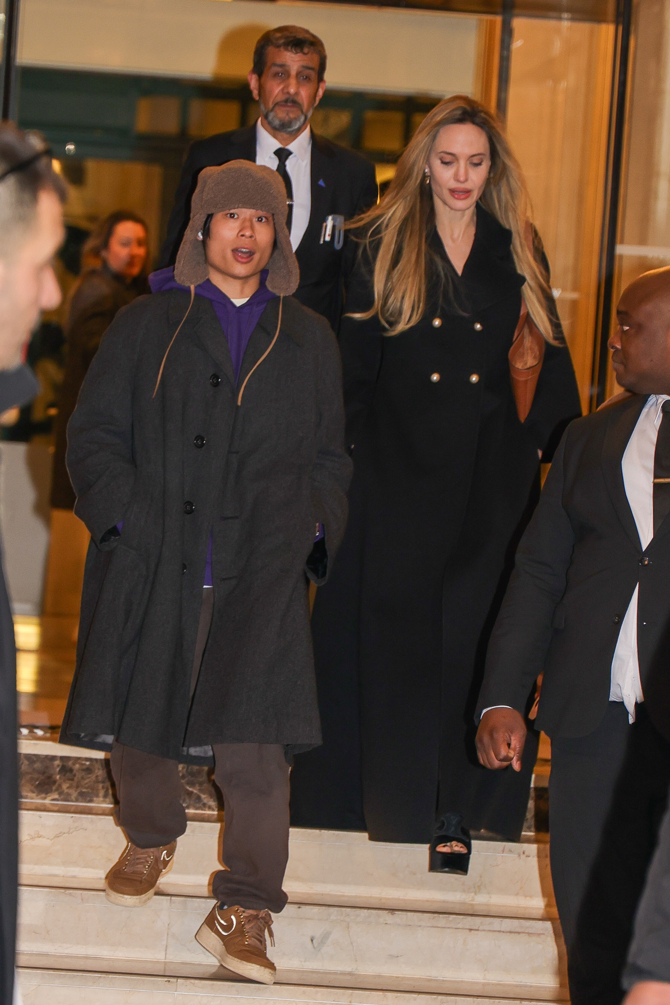 Pax Jolie-Pitt and Angelina Jolie photographed on December 10, 2024, in Paris, France. | Source: Getty Images