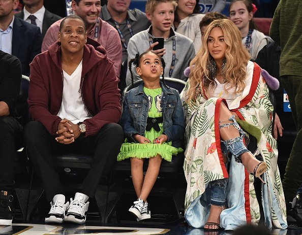 Jay Z, Blue Ivy Carter and Beyonce Knowles attend the 66th NBA All-Star Game at Smoothie King Center in New Orleans, Louisiana. | Photo: Getty Images