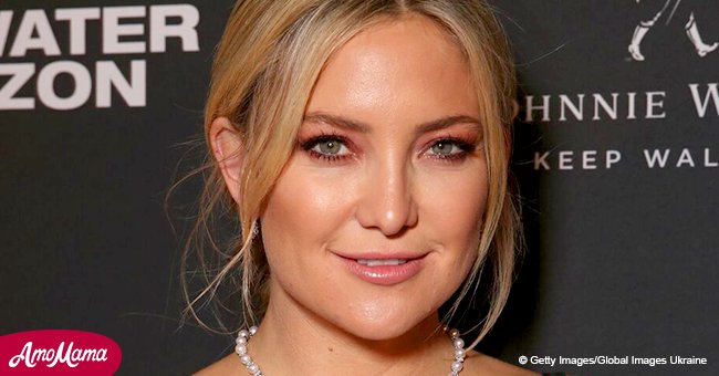Kate Hudson shows off her baby bump in form-fitting dress