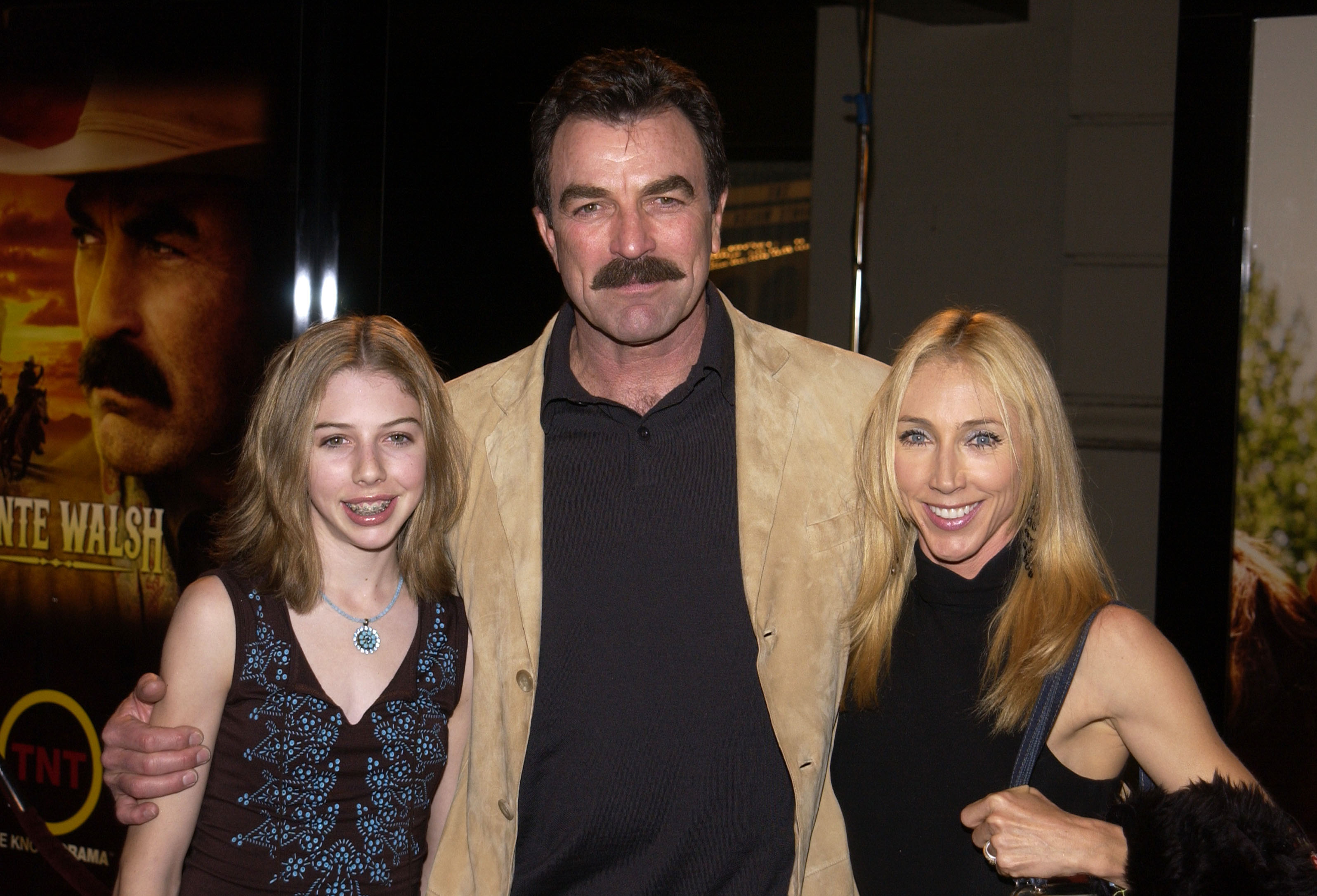 Hannah and Tom Selleck with Jillie Joan Mack at TNT's "Monte Walsh" premiere in 2003 | Source: Getty Images