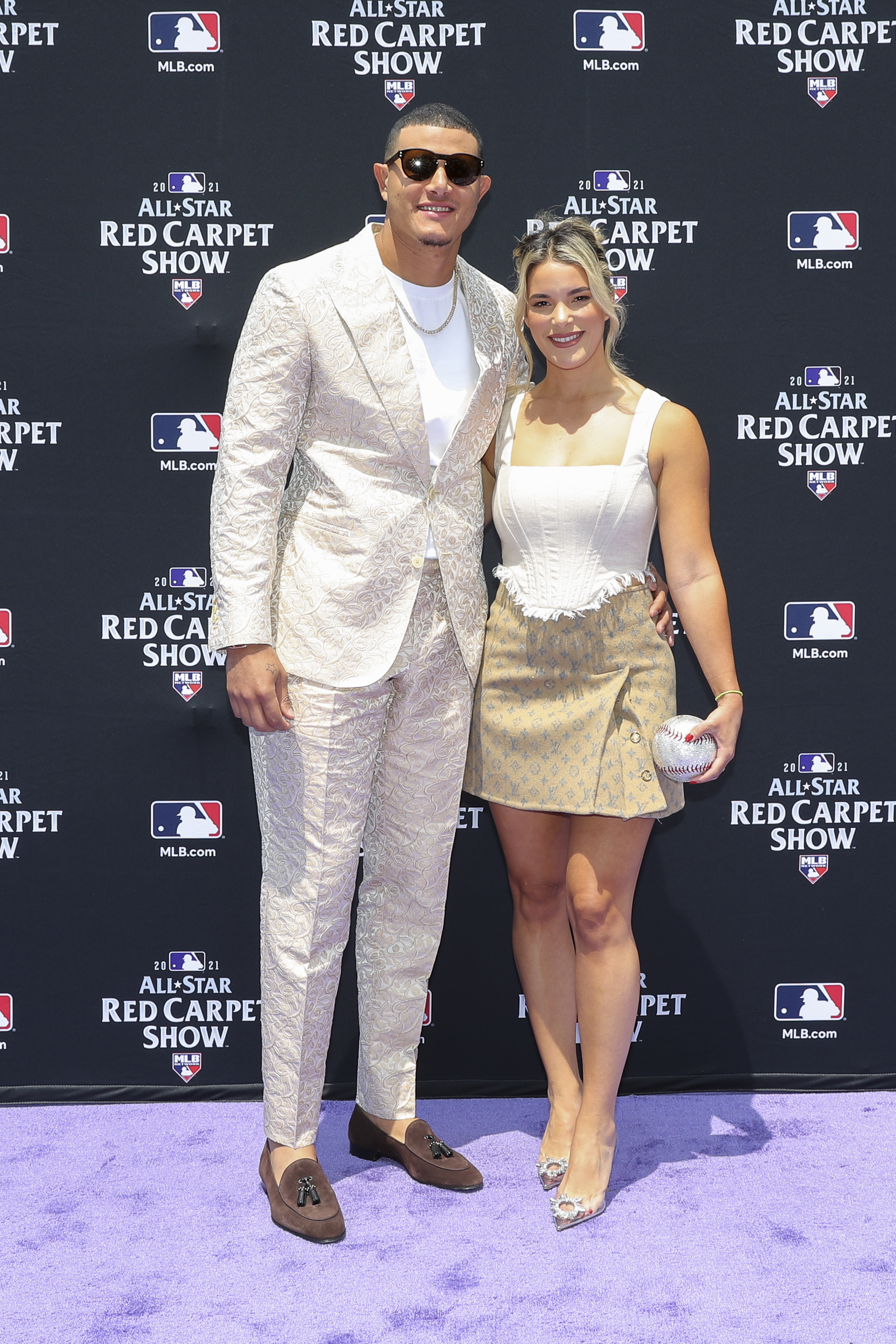 Manny Machado and Yainee Alonso at the MLB All-Star Red Carpet Show at Downtown Colorado on Tuesday, July 13, 2021, in Denver, Colorado. | Source: Getty Images