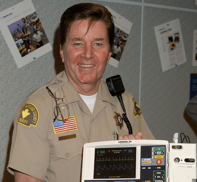 Undated image of Bobby Sherman, now a San Bernardino County Deputy Sheriff, holding a Life Pak 20 Defibrillator / Monitor in Los Angeles | Photo: Getty Images