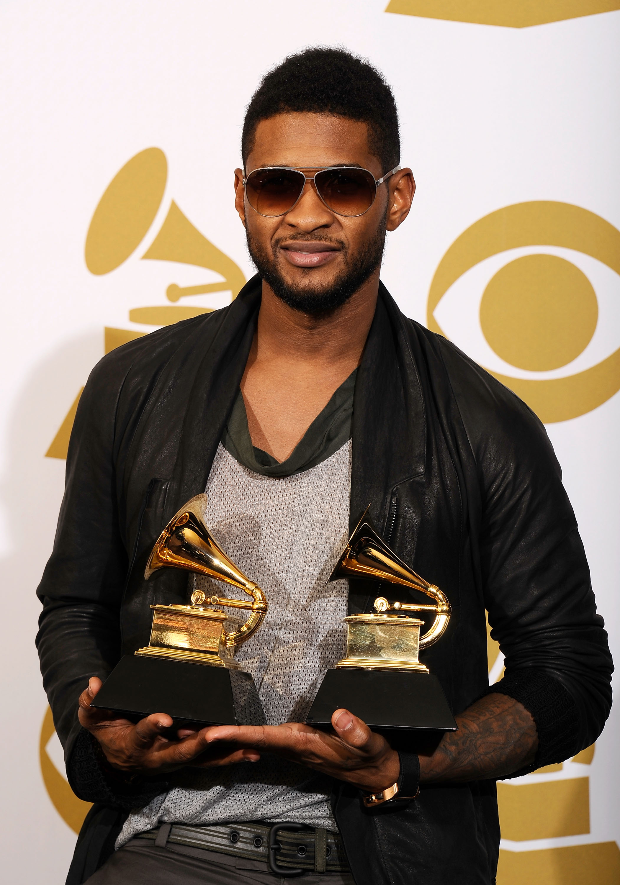 Usher poses in the press room at The 53rd Annual GRAMMY Awards on February 13, 2011 in Los Angeles, California | Source: Getty Images