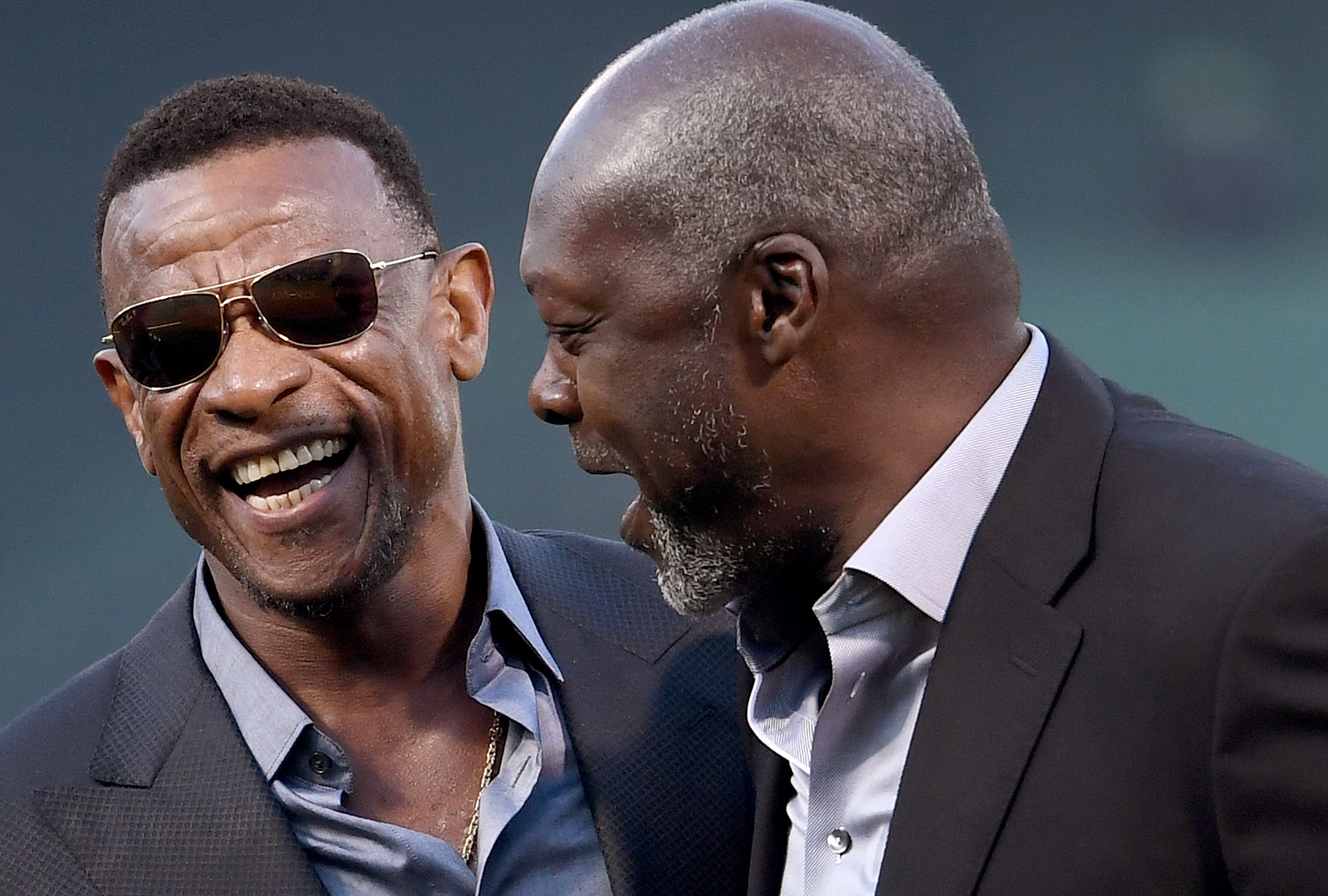 Rickey Henderson and Dave Stewart stand together during the opening night game between the Los Angeles Angels and Oakland Athletics at the Oakland Coliseum on April 3, 2017 | Source: Getty Images