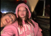 Jordan roe is in a pink sweatshirt with a hood as another girl lays her head on Jordan's shoulder, dated June 24, 2025 | Source: Gofundme