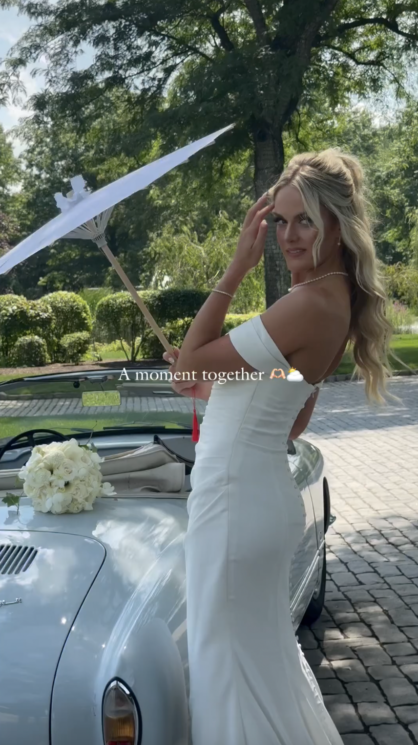 Victoria Schultz posing next to a vintage car, posted on July 10, 2024 | Source: Instagram/antpagephoto, alenkafilms and victoriajrunyan