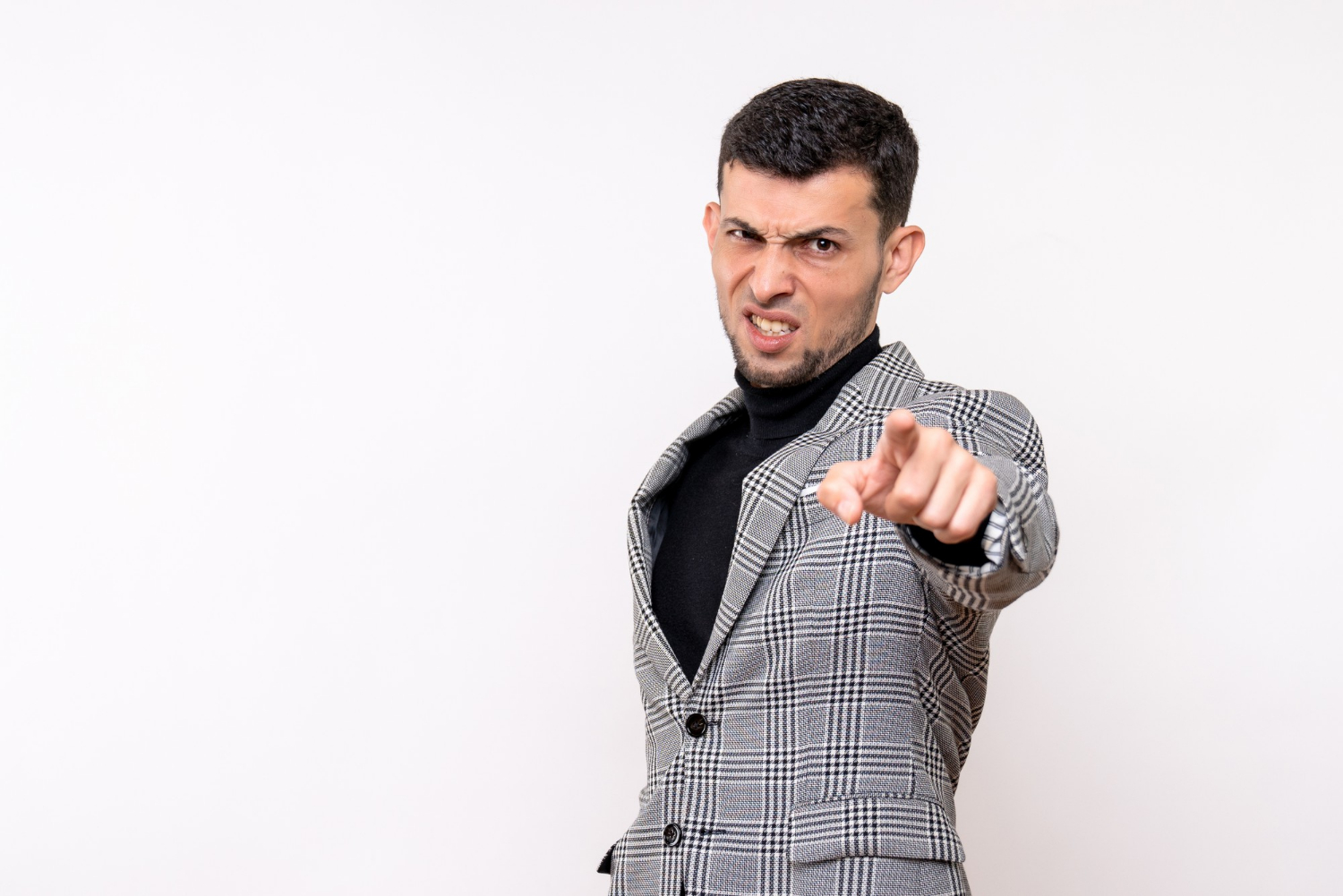 An angry man pointing his finger | Source: Freepik