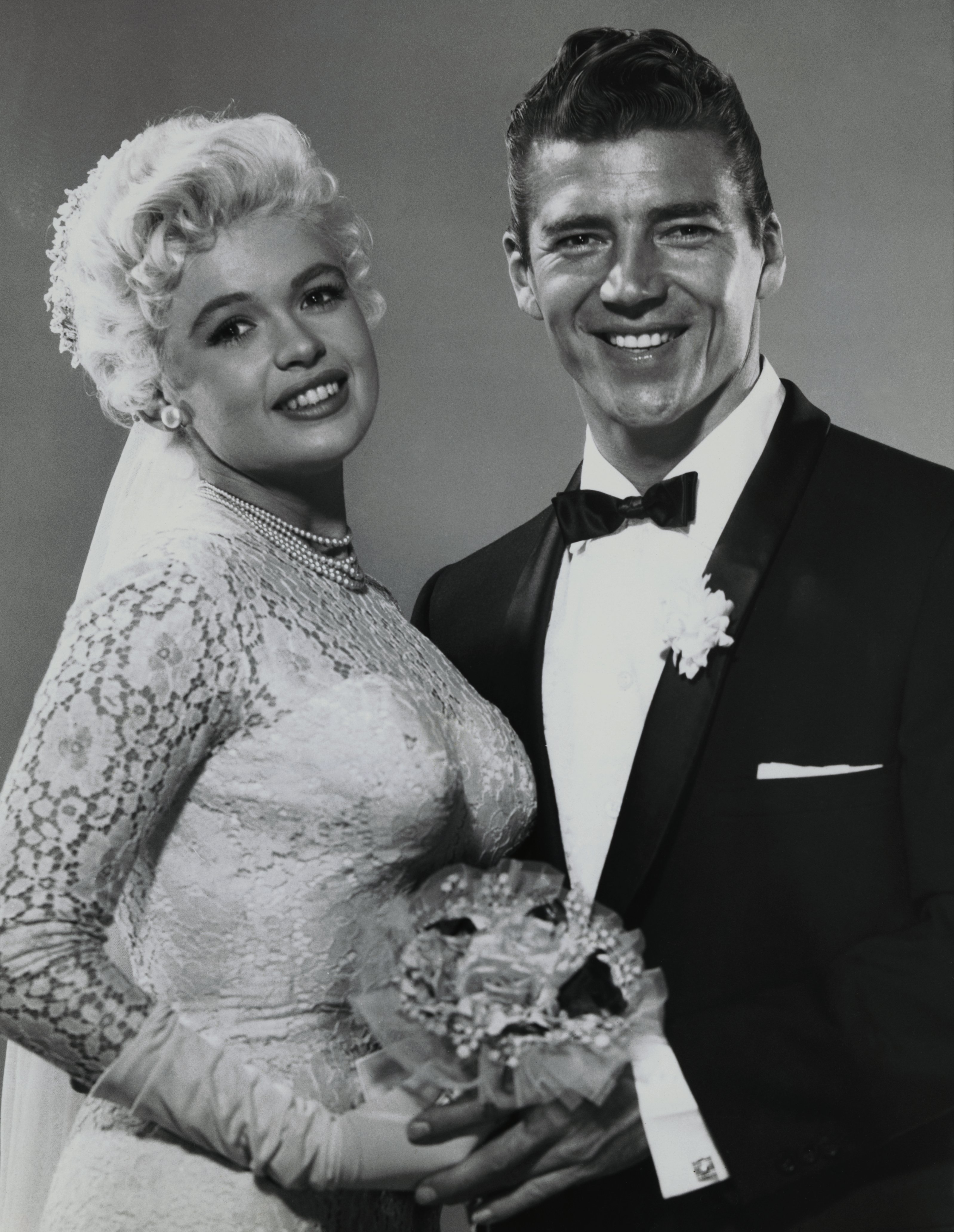 Jayne Mansfield and Mickey Hargitay in their wedding attire before their ceremony at Palos Verdes, California on January 10, 1958 | Source: Getty Images