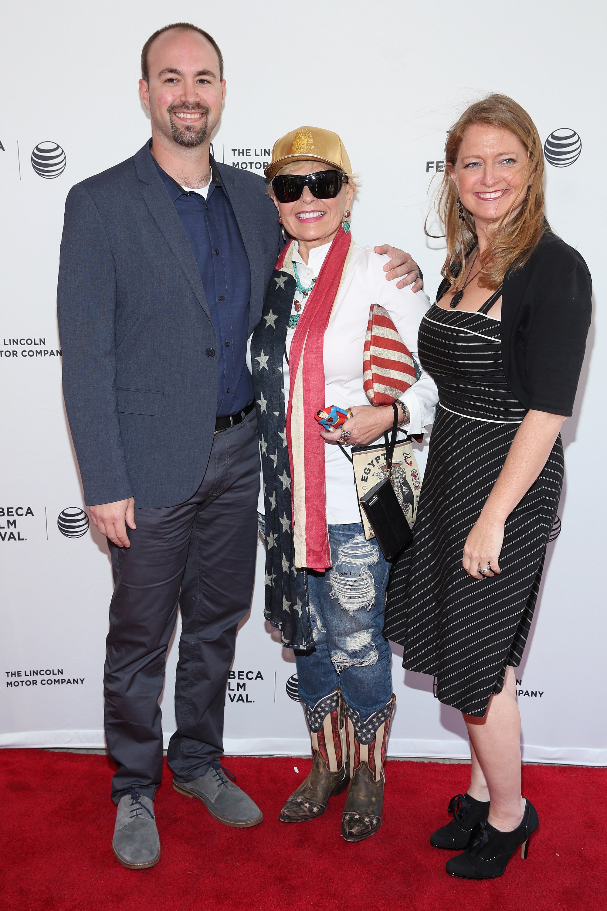 Jake Pentland, Roseanne Barr, and Brandi Brown at the world premiere of documentary: "Roseanne For President!" on April 18, 2015 | Source: Getty Images