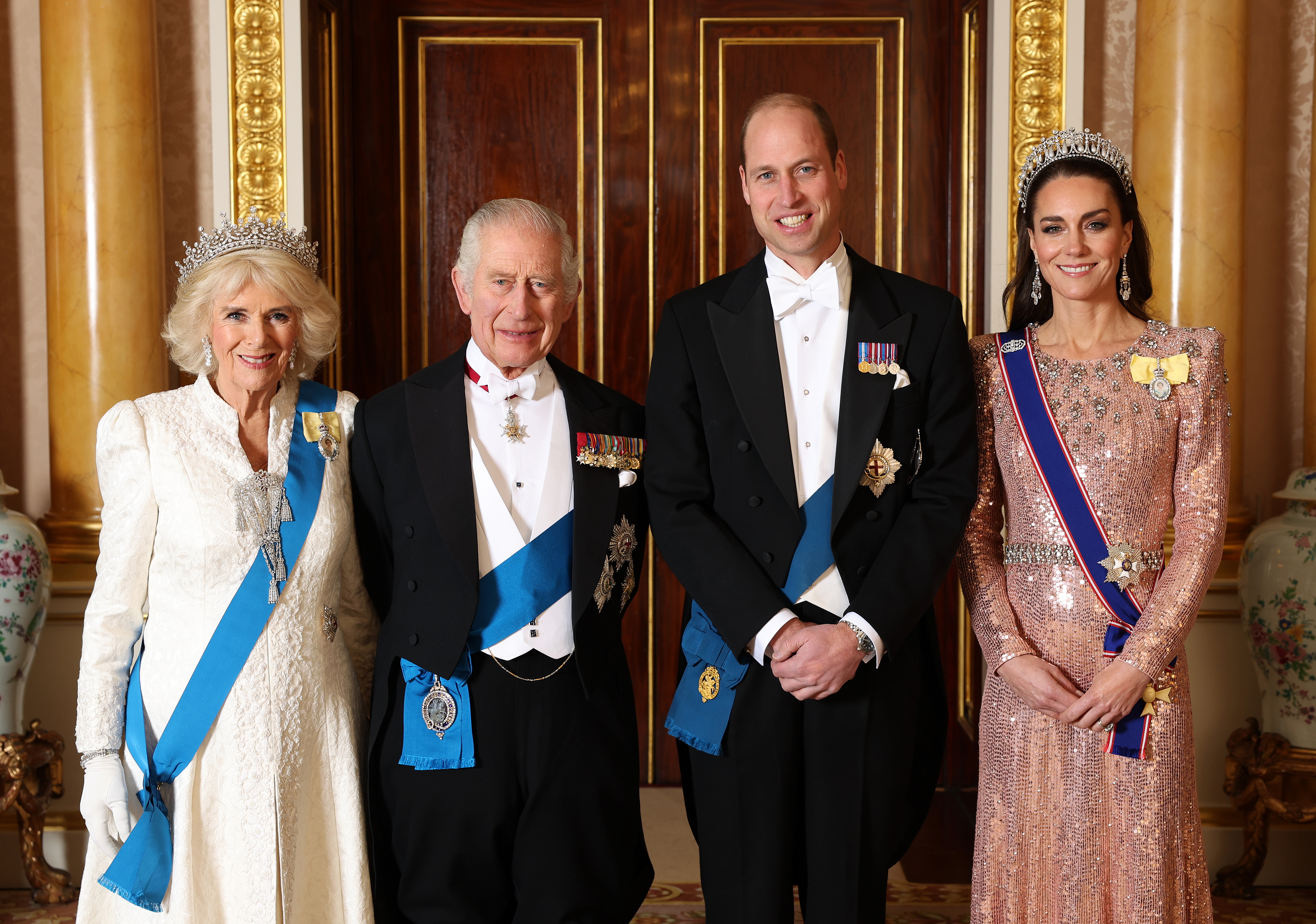 Queen Camilla, King Charles III, Prince William, Prince of Wales, and Catherine, Princess of Wales, pose for a photograph ahead of The Diplomatic Reception at Buckingham Palace in London, England on December 05, 2023. | Source: Getty Images