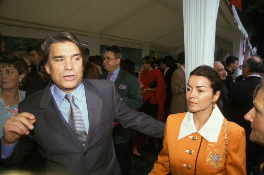 Bernard Tapie et son épouse Dominique a la garden-party de l'Elysee le 14 juillet 1993 a Paris, France. | Photo : Getty Images