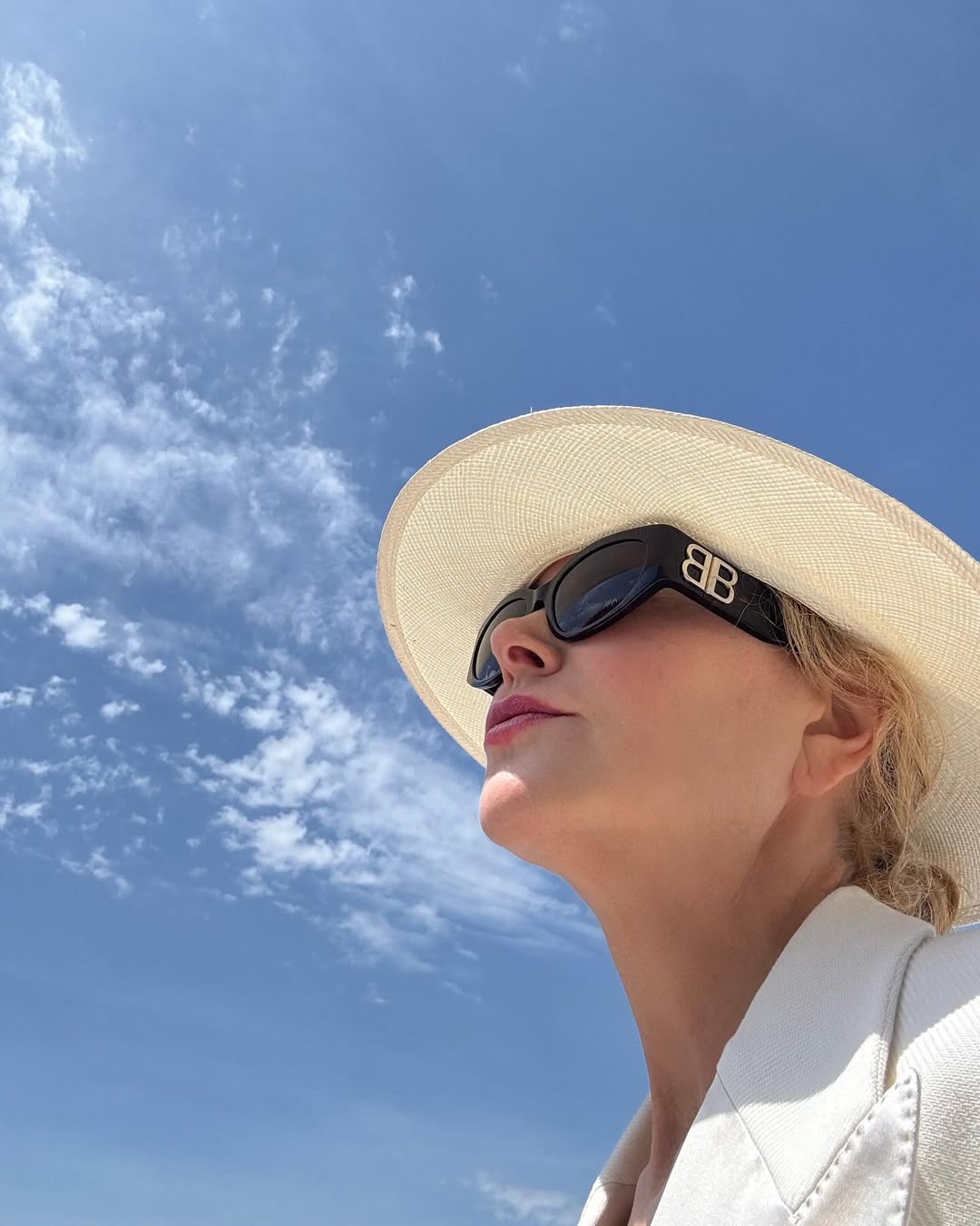 Nicole Kidman wearing a hat and sunglasses, but still showing of her curly hair in Côte d’Azur, France, from her post dated May 19, 2025 | Source: Instagram/nicolekidman