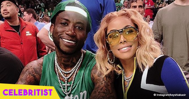 Keyshia Ka'oir rocks skimpy shorts & white stockings in Disney World date with husband Gucci Mane