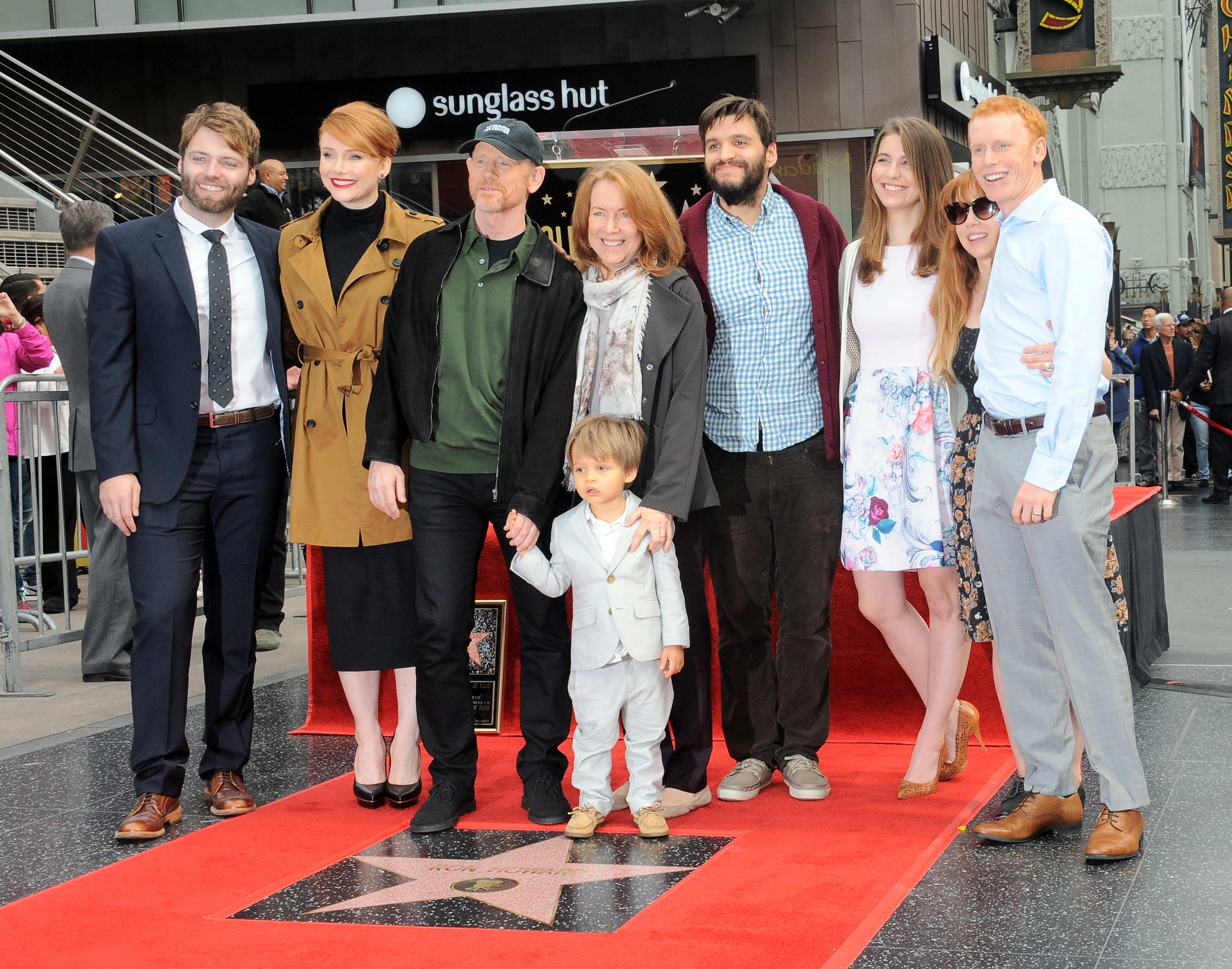 Seth Gabel, Bryce Dallas Howard, Ron Howard, Cheryl Howard and other family members at the Ron Howard Star ceremony on The Hollywood Walk of Fame held in Hollywood, California, on December 10, 2015. | Source: Getty Images