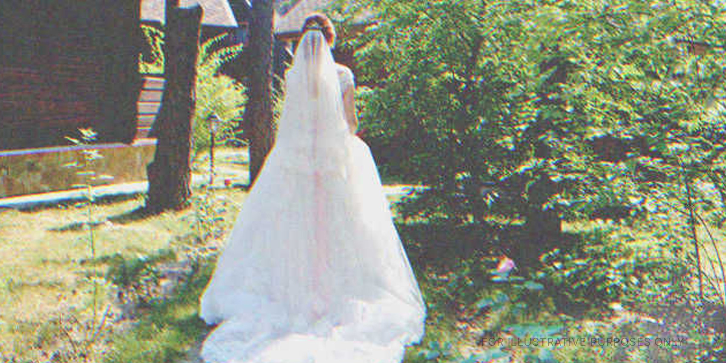 A bride standing near trees | Source: Shutterstock
