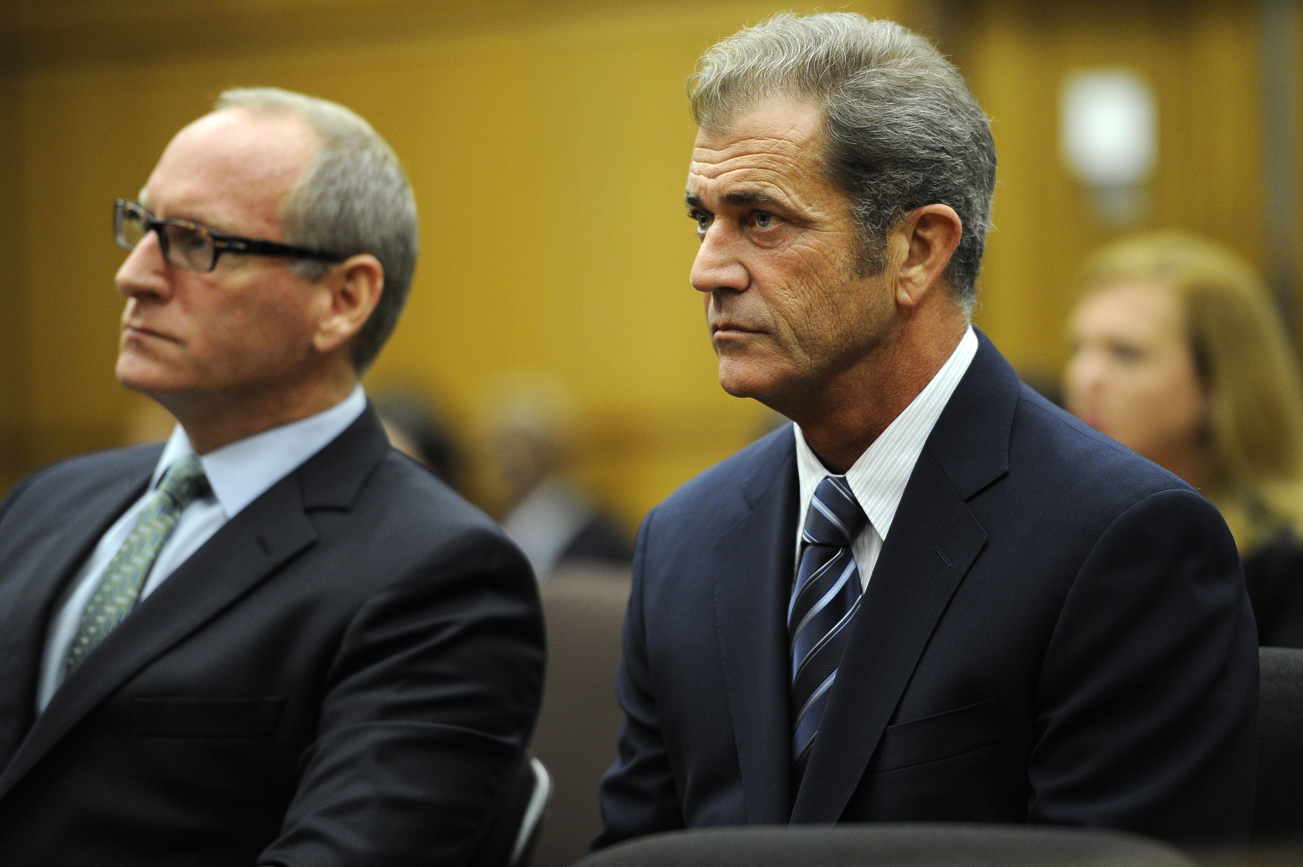 Academy Award-winning actor/director Mel Gibson (R) appears with his lawyer Larry Ginsberg (L) at the Los Angeles Superior Court on August 31, 2011, in downtown Los Angeles. | Source: Getty Images