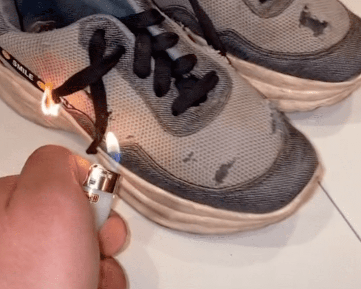 Man sets his cousin's sneakers on fire | Photo: TikTok/@itsnastynaz