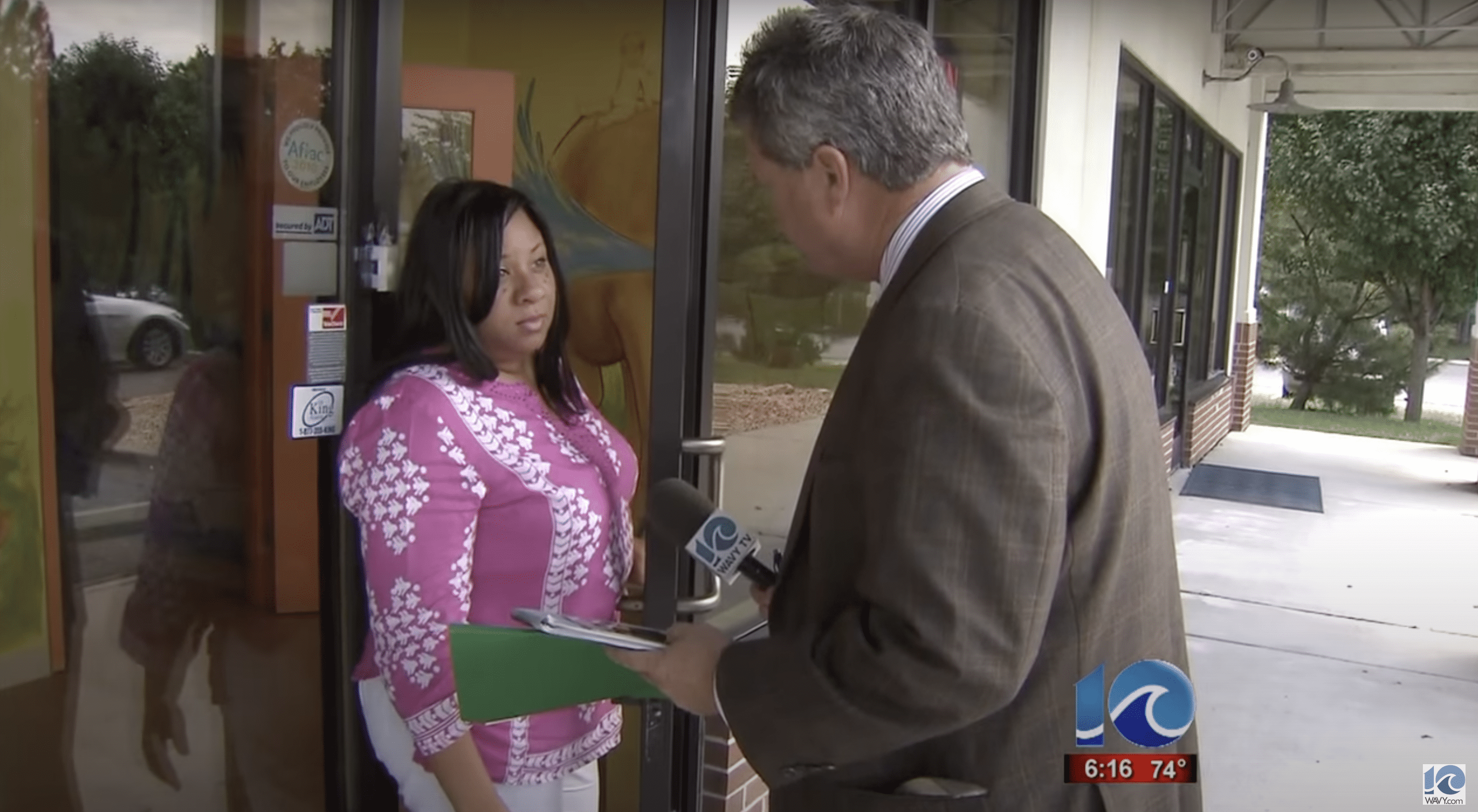 WAVY News Reporter Andy Fox pictured talking to the Daycare Owner, Juanita Brown. | Source: youtube.com/WAVY TV 10