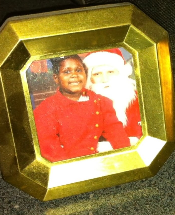 The actress posing for a holiday photo with Santa | Source: Instagram/gabbysidibe