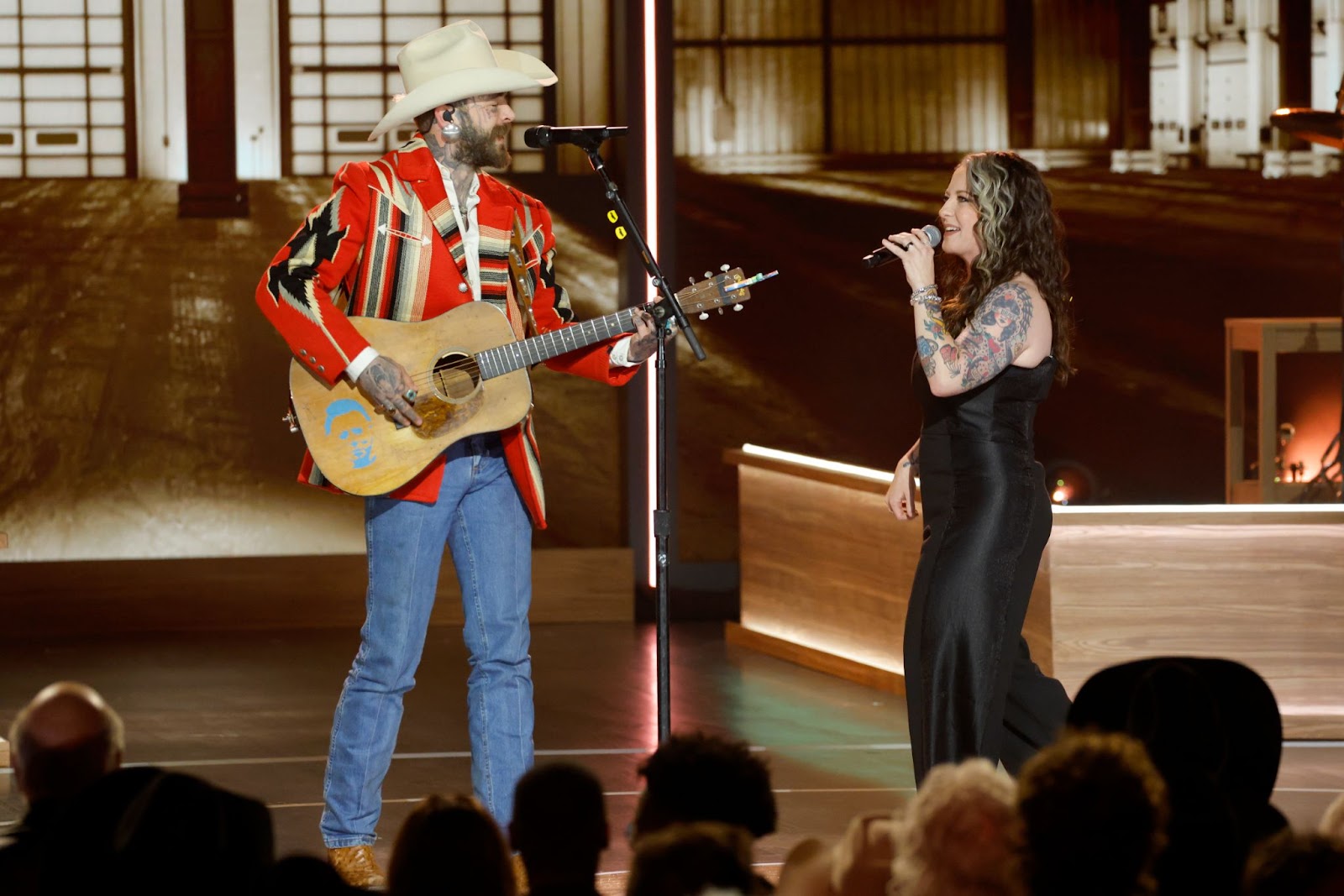 Post Malone and Ashley McBryde’s looks on display at the Ryman Auditorium | Source: Getty Images