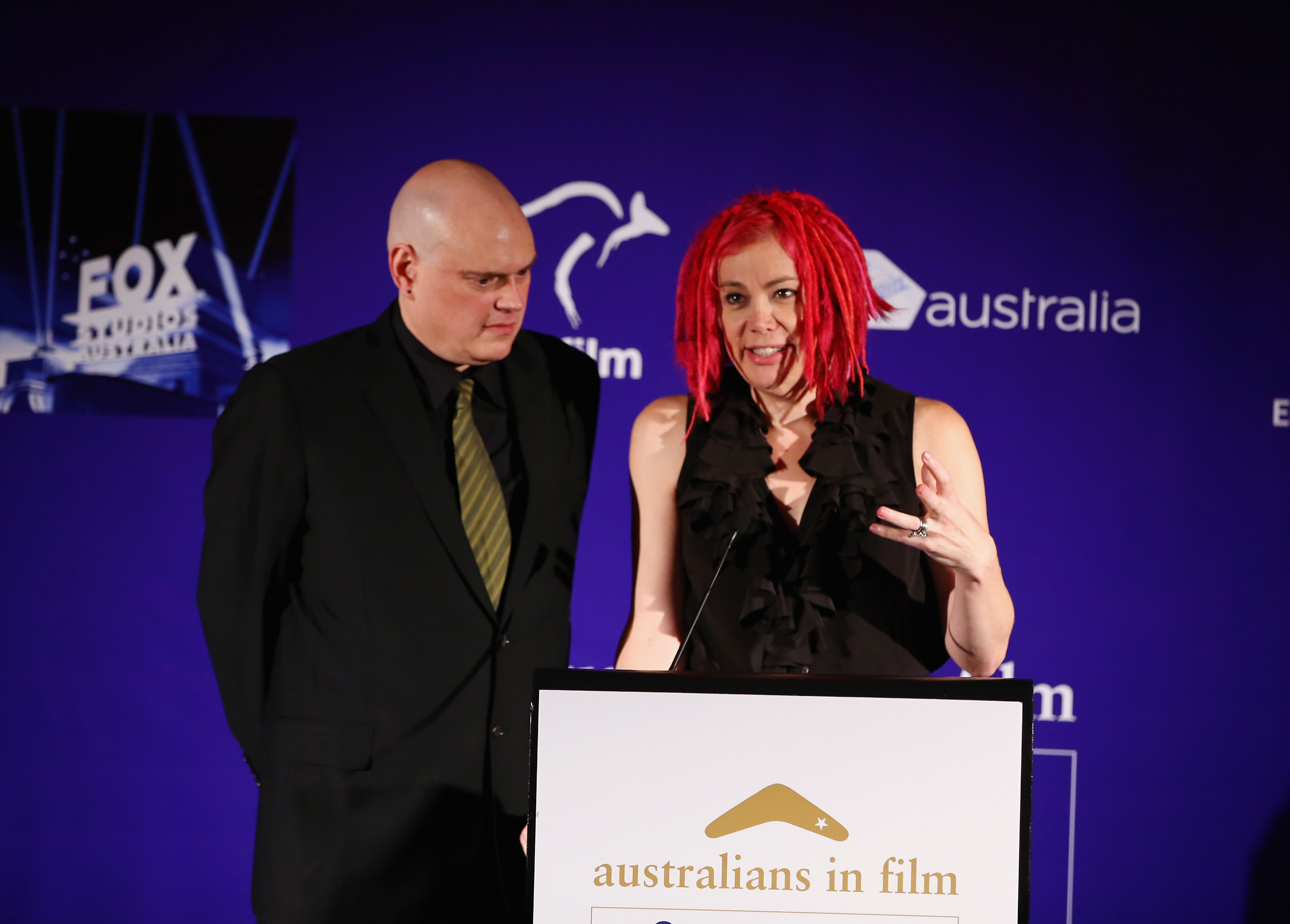 Andy Wachowski and Lana Wachowski speak onstage at the 2nd Annual Australians in Film Awards Gala at Intercontinental Hotel on October 24, 2013 in Beverly Hills, California. | Source: Getty Images