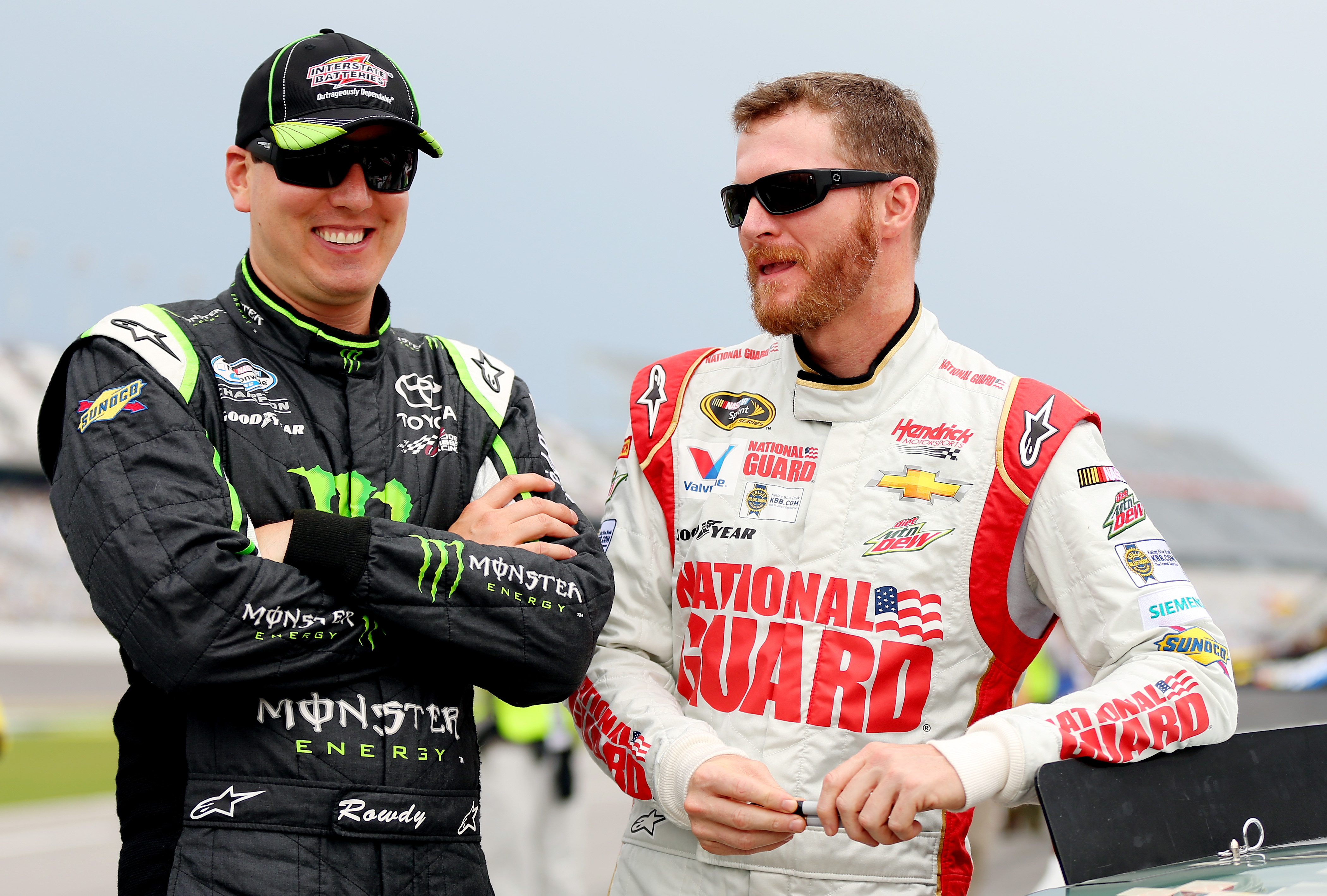Kyle Busch and Dale Earnhardt Jr. during qualifying for the NASCAR Sprint Cup Series Coke Zero 400 in Daytona Beach, Florida on July 4, 2014. | Source: Getty Images
