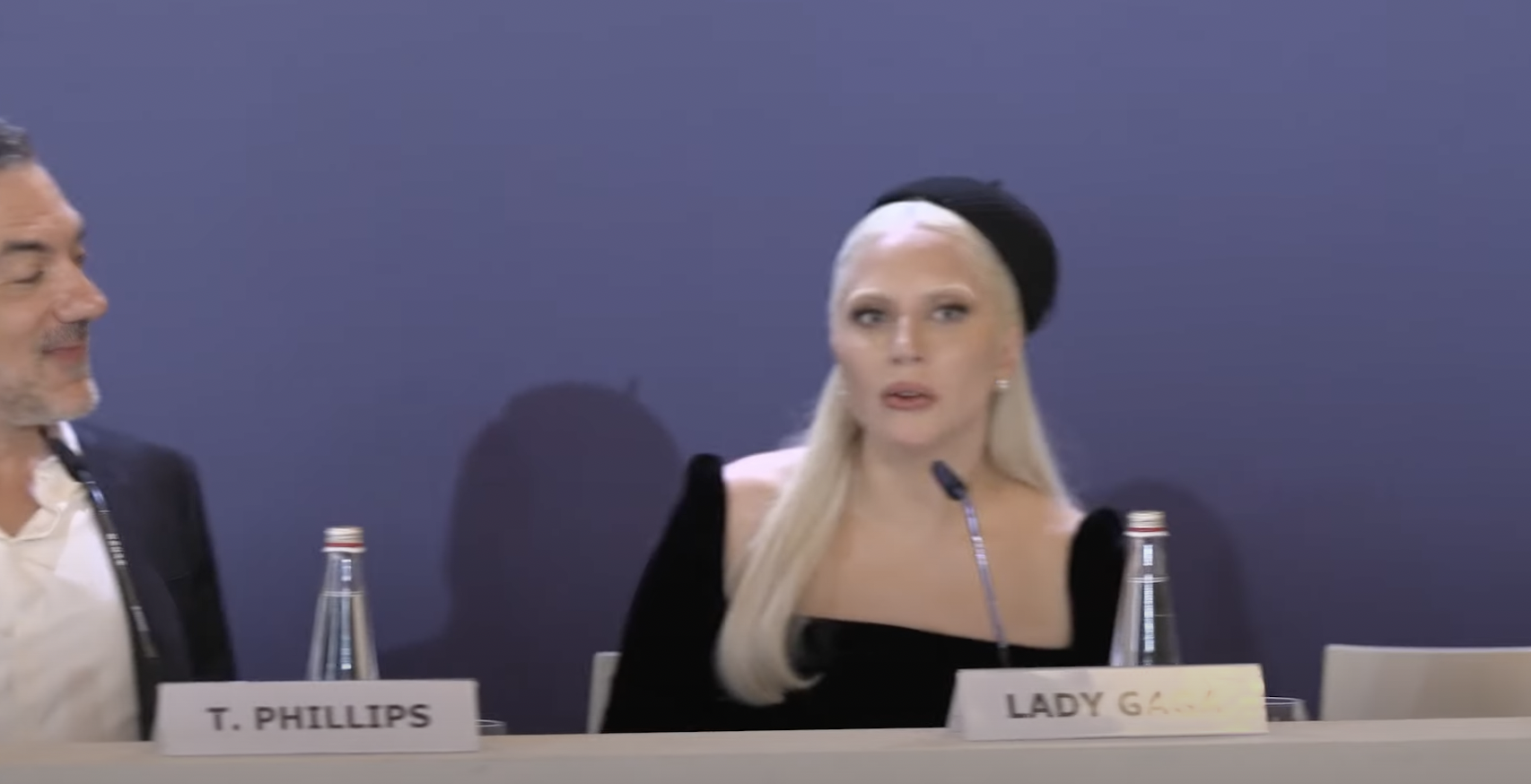 Lady Gaga reacts to Joaquin Phoenix praising her weight loss, during a Venice Film Festival press conference, from a YouTube video, dated September 4, 2024 | Source: Youtube/@pagesix